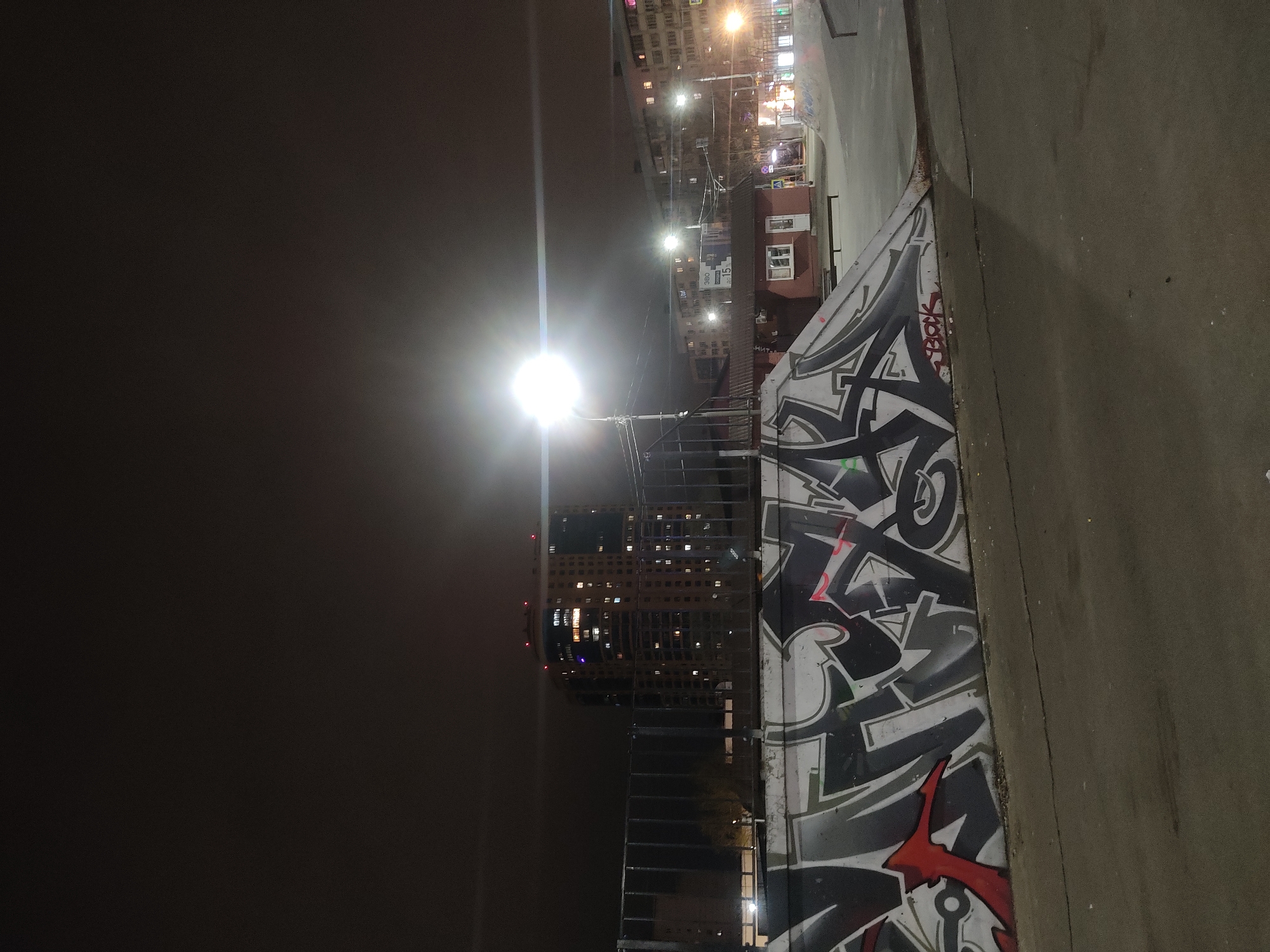 Nighttime graffiti scene documented at Reutov skatepark