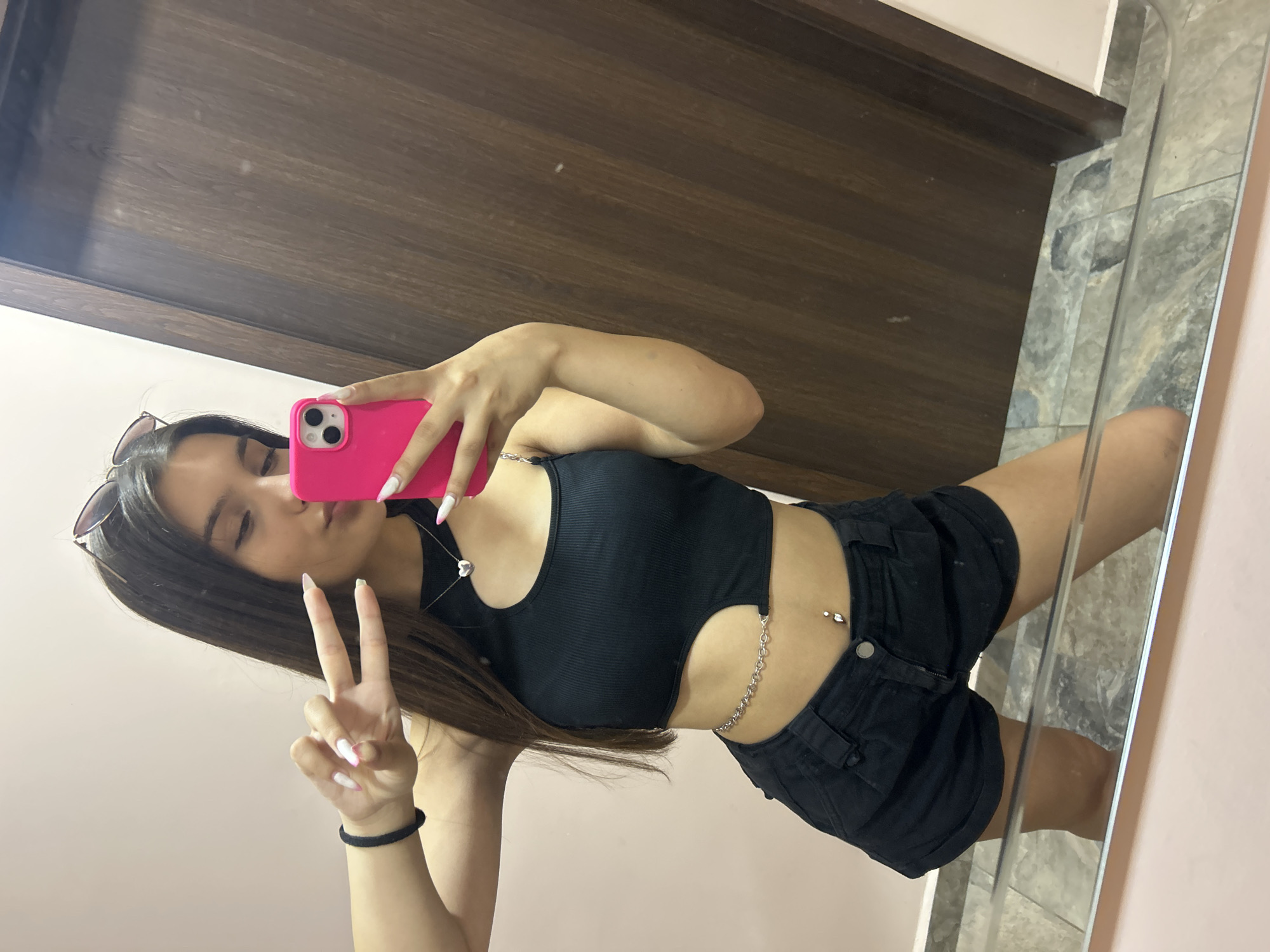 Mirror selfie series in Shumen, black crop top and chain accessory
