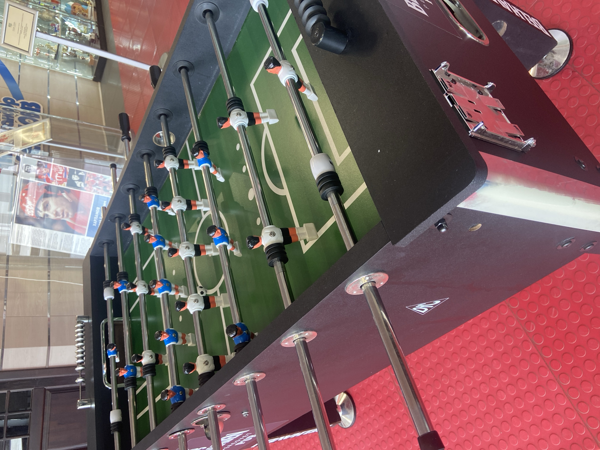 Visitor documents recreational facility with Soviet hockey memorabilia in Peresvet