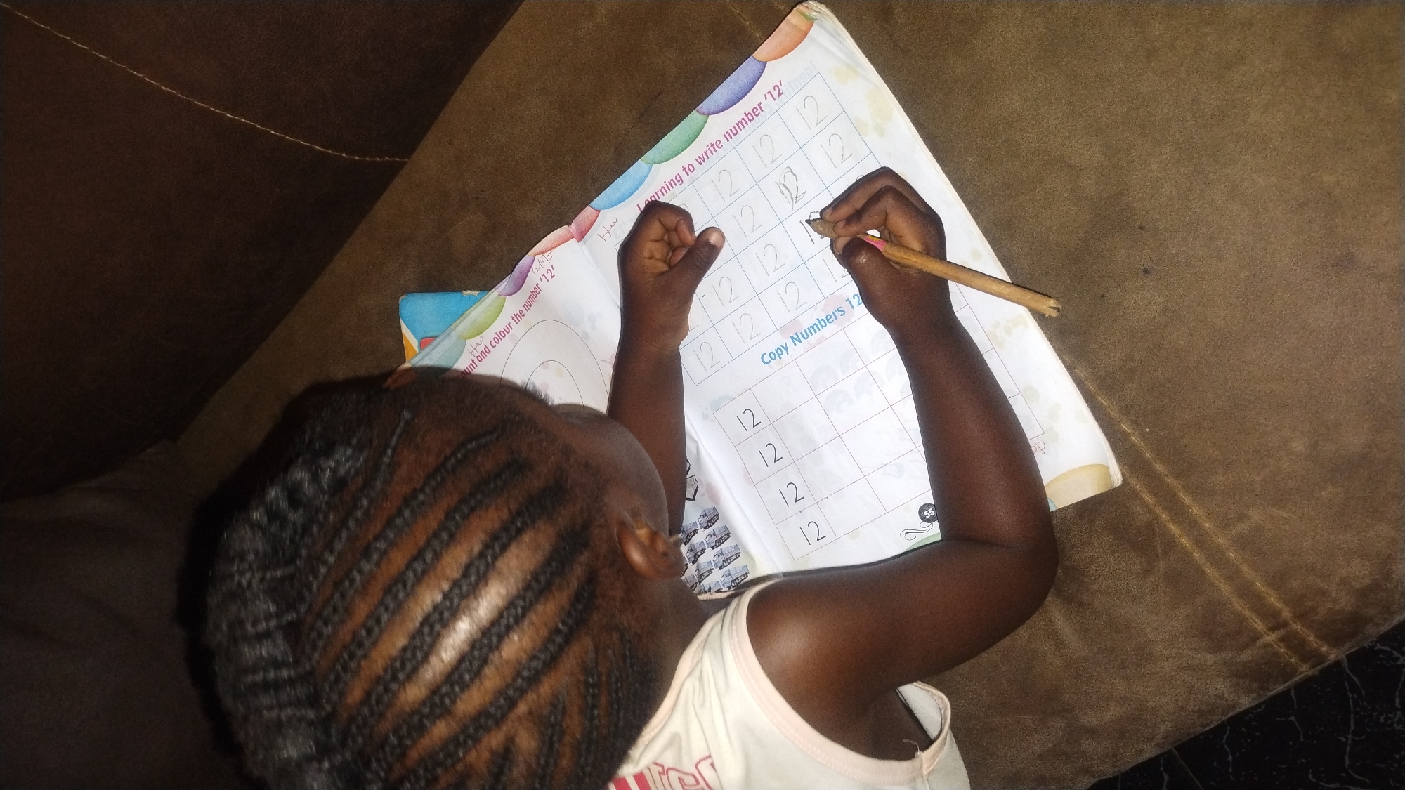 Morning learning and cooking routines captured in Jos household