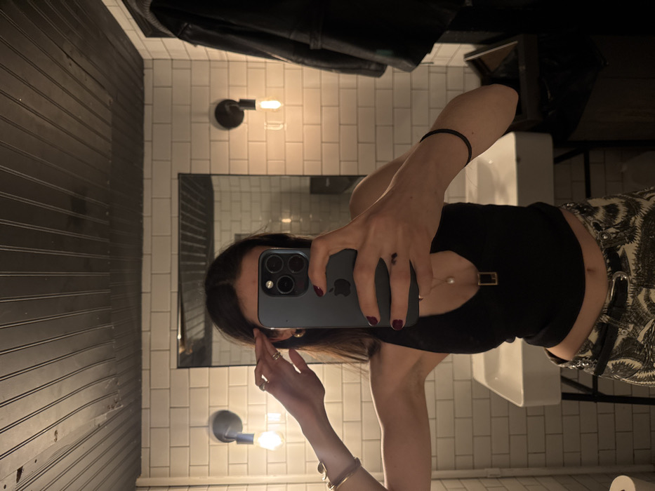 Woman documents late-night NYC establishment visit through personal photographs