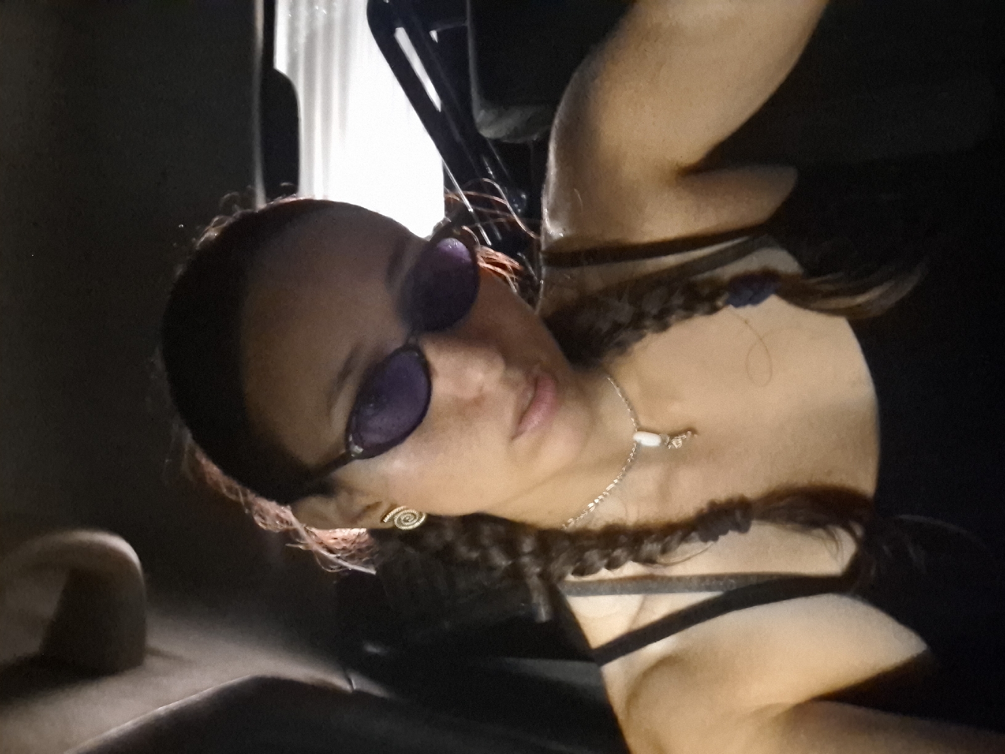 Woman in sunglasses observed in vehicle in Buenos Aires