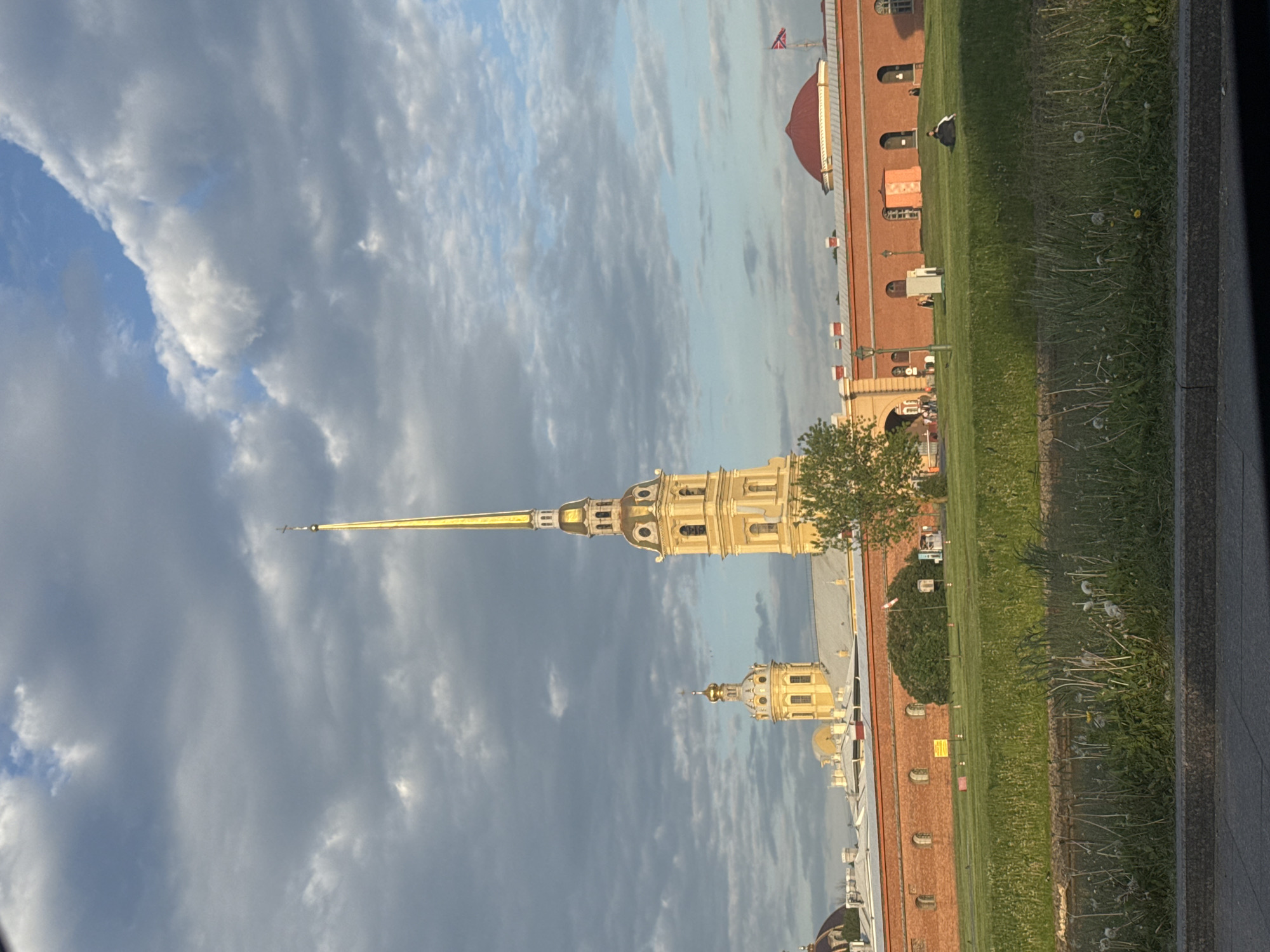 Tourist photographs Peter and Paul Cathedral in Saint Petersburg