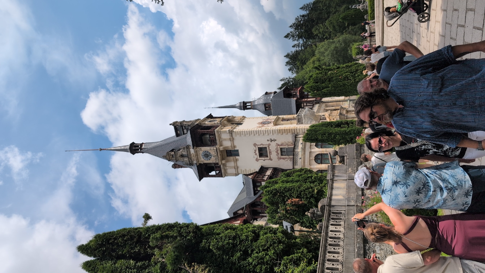 Peles Castle and its Carpathian surroundings on a summer morning
