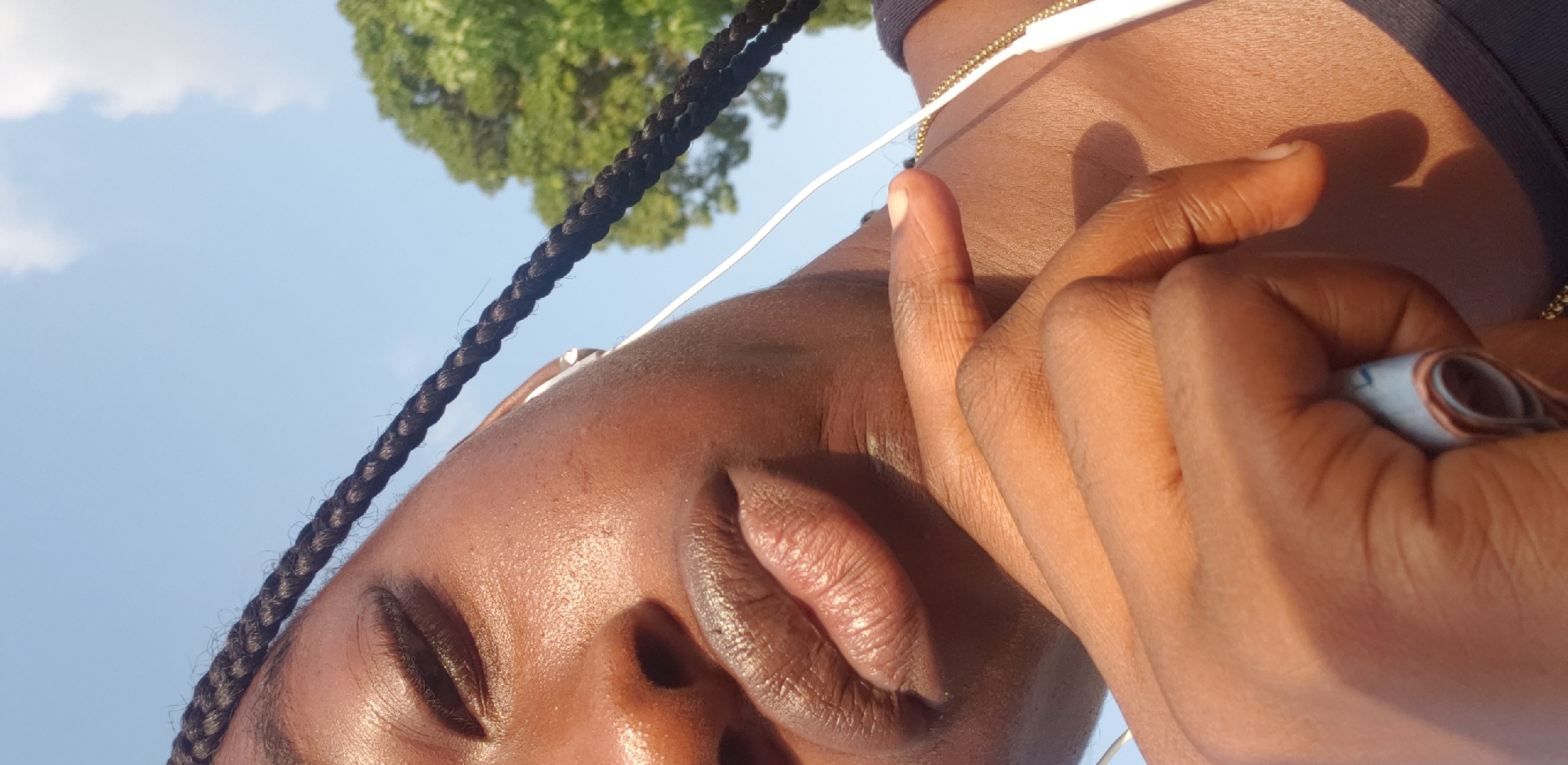 Portrait captured against blue sky in Narayi, Nigeria