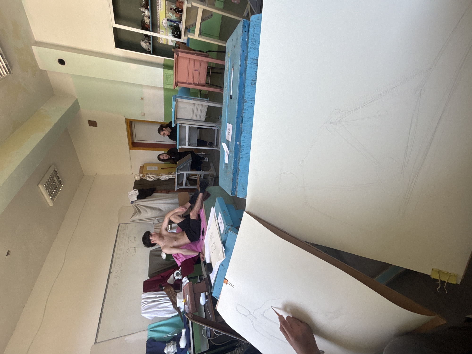Life drawing session with male model observed in Troyan studio