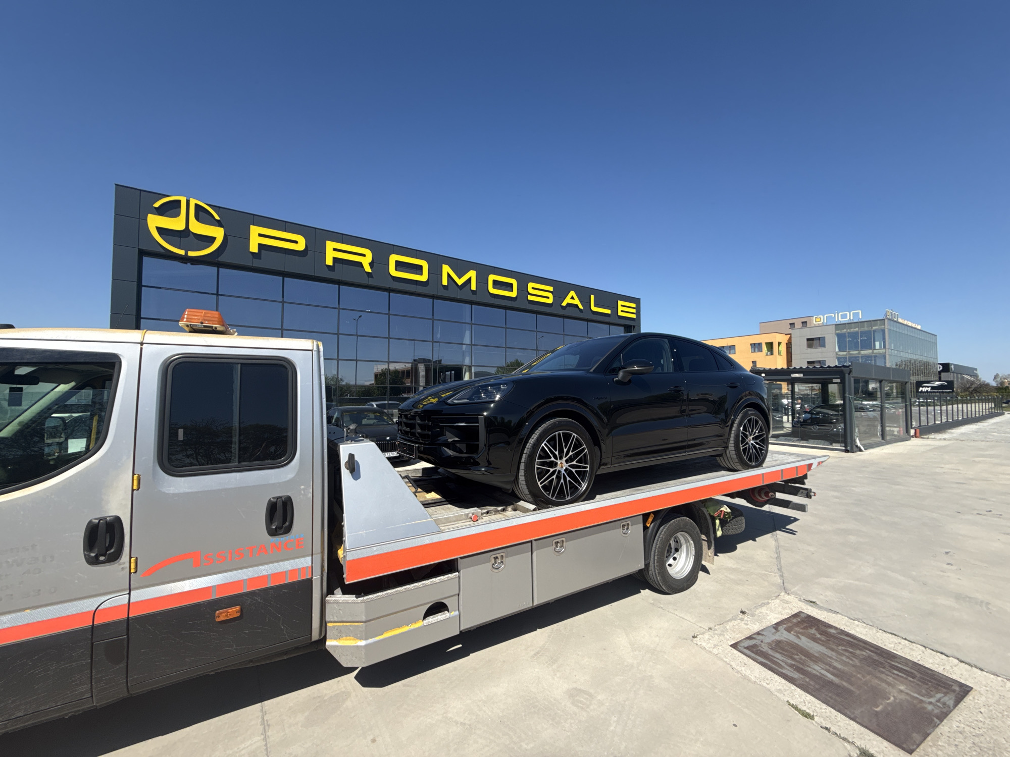 Black Porsche SUV towed in Plovdiv, Bulgaria