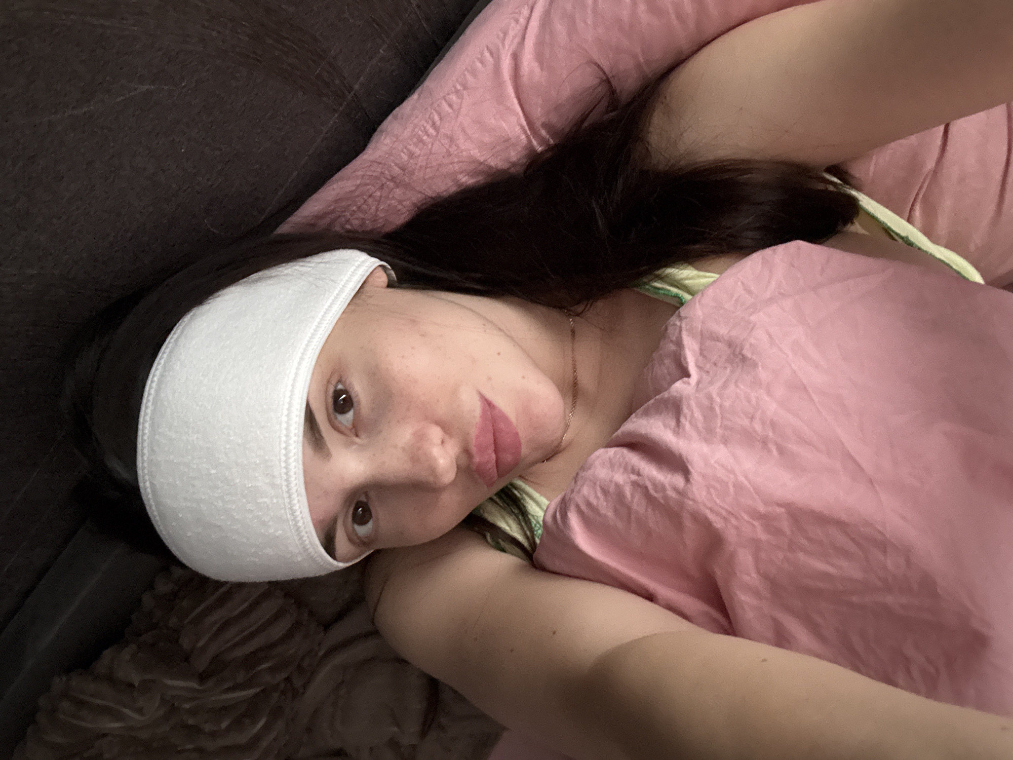 Person documents recovery with playful selfies while wearing head bandage