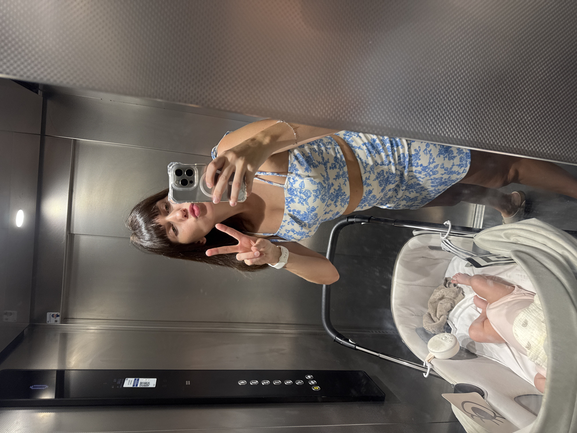 Quick stop in a modern Sicilian building, elevator selfies and a stroller