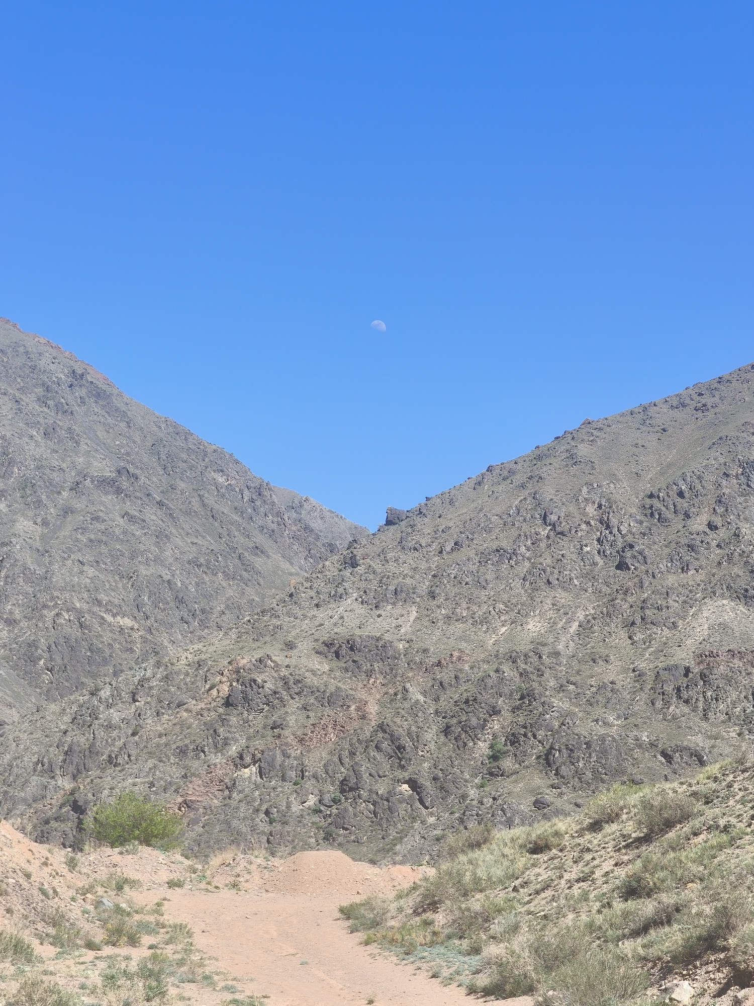 Morning hike documented in Kyrgyzstan mountain valley near Krasnyy Most
