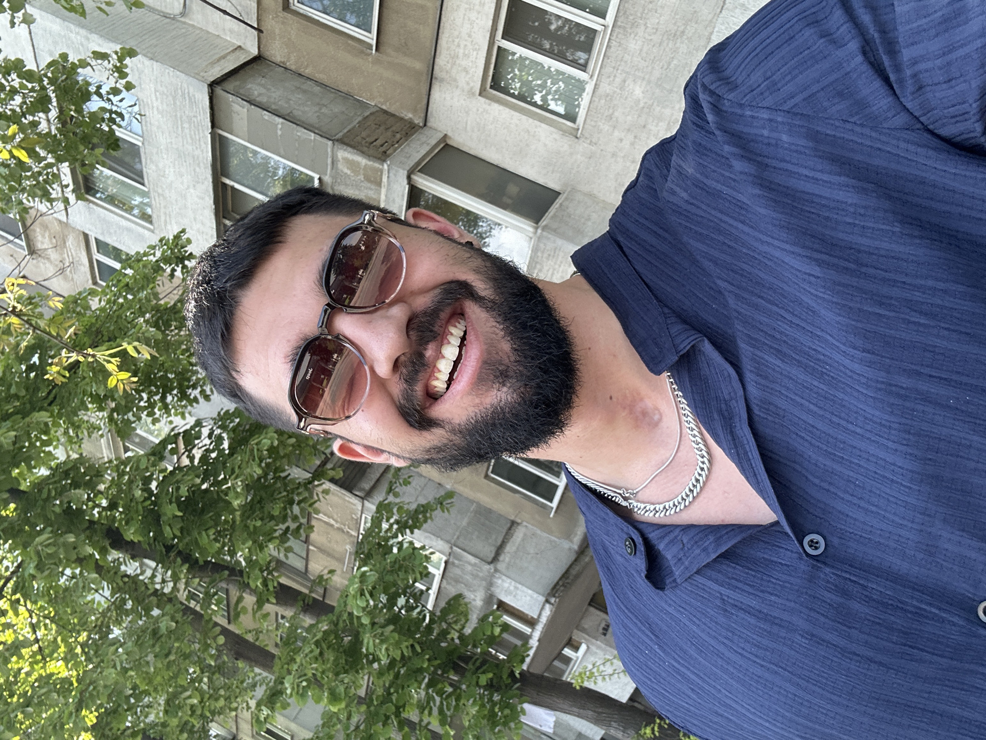 Man takes selfies outdoors in Sofia, Bulgaria