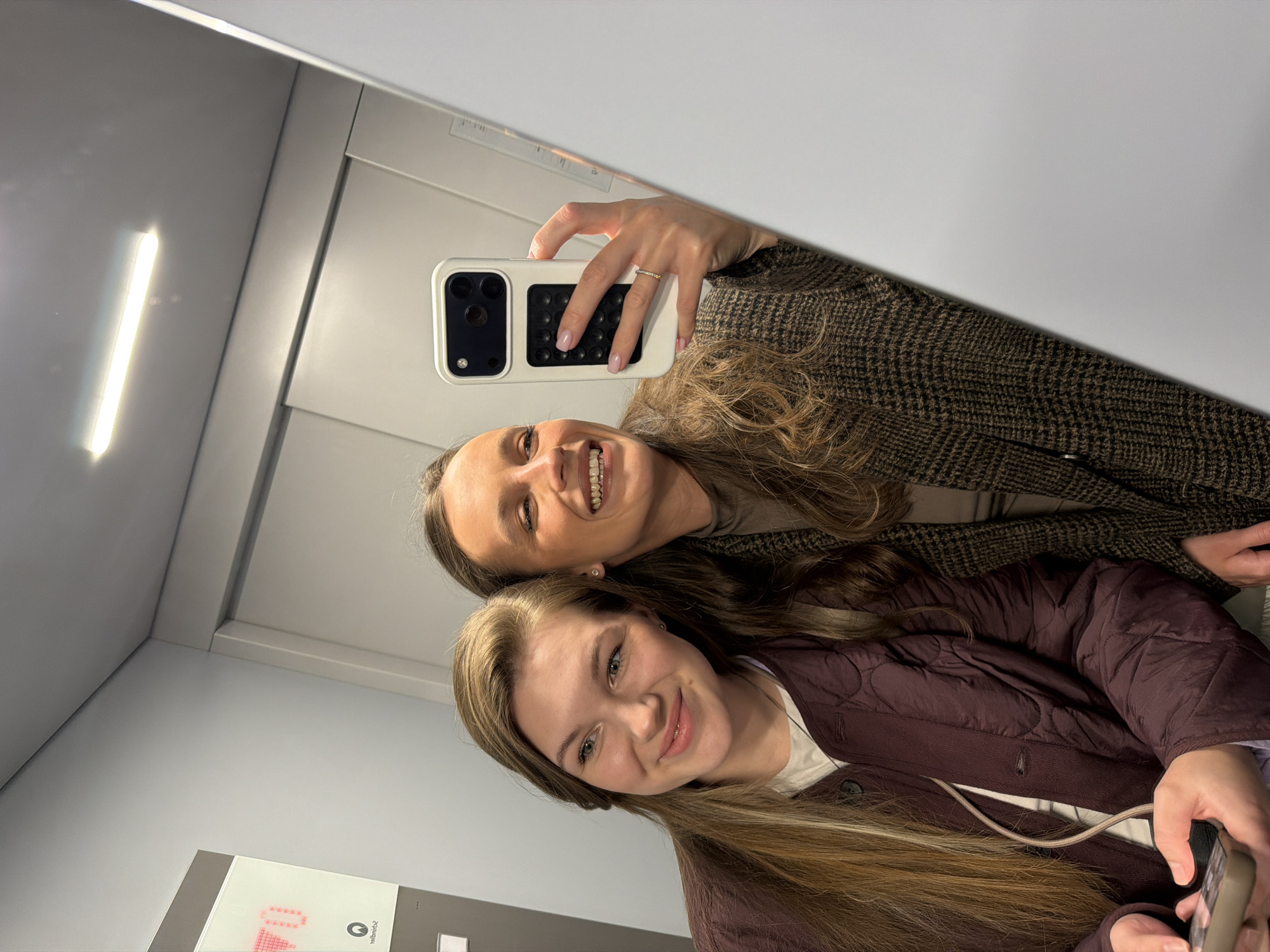 Two women take selfie in Belgrade elevator