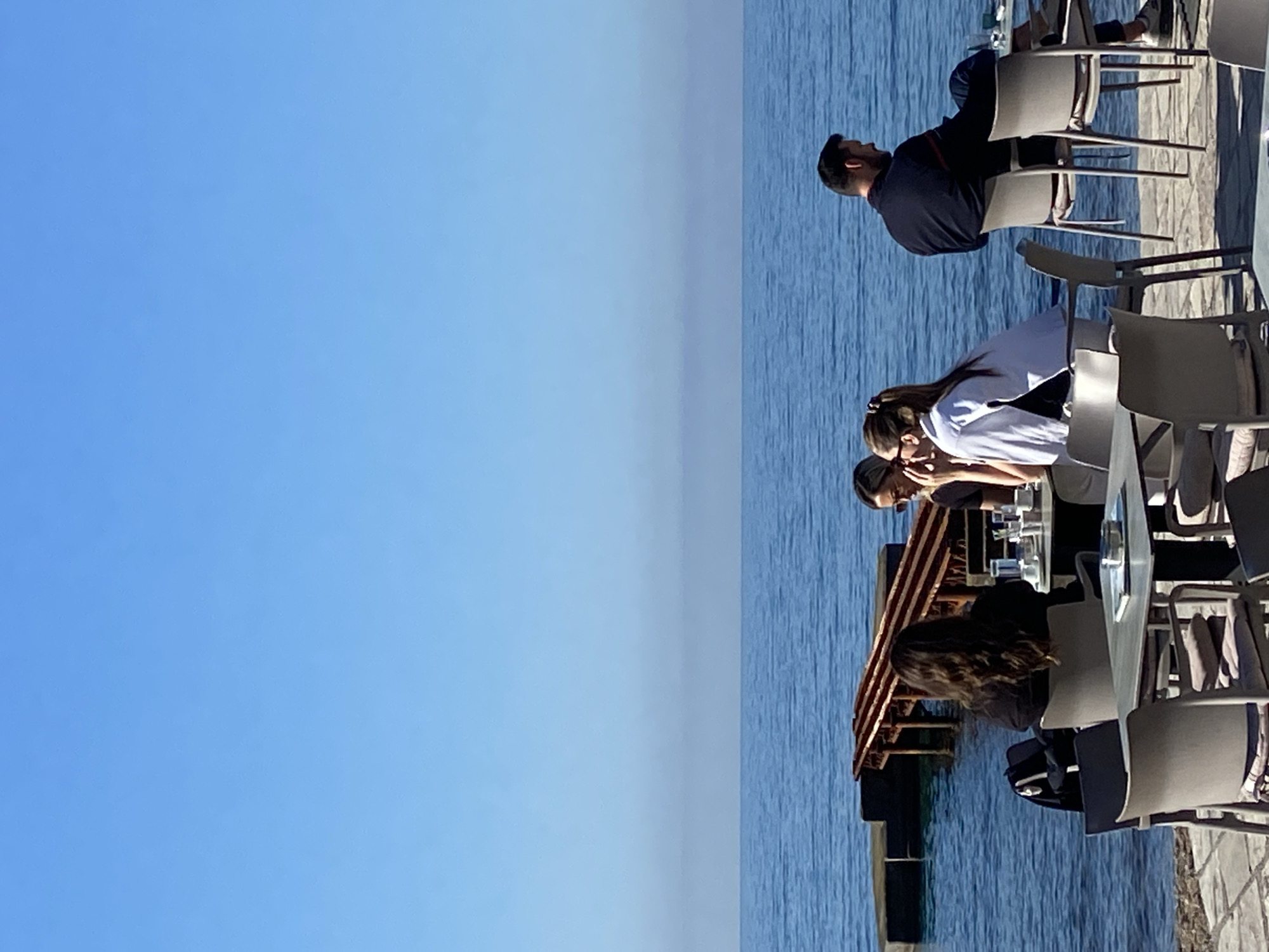 Morning waterfront scenes captured at Budva marina and café