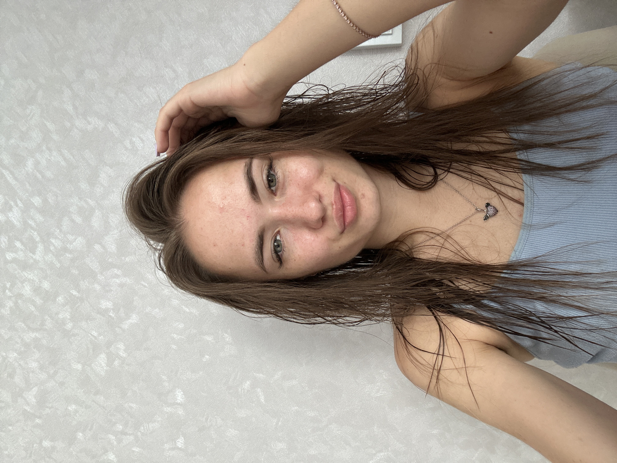 Post-shower selfie series, same wall, different poses
