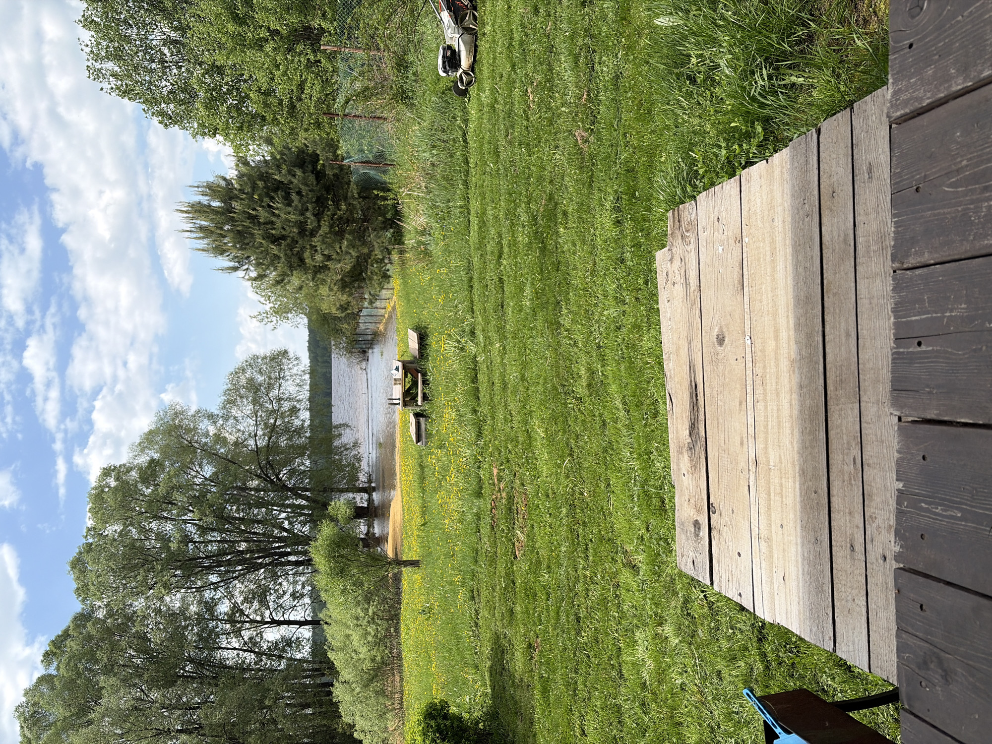 Lakeside property maintenance documented in rural Russia