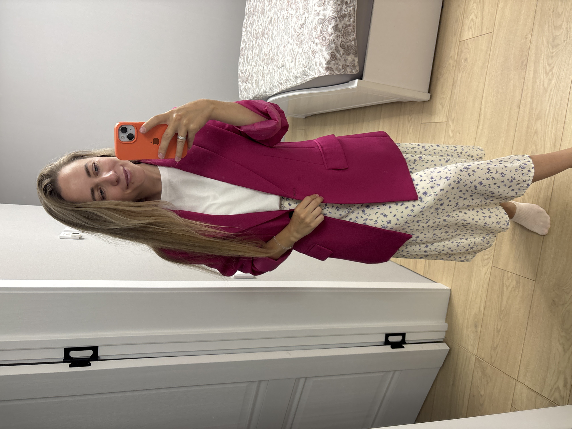 Mirror selfies in a Chaikovsky bedroom, pink blazer and floral skirt