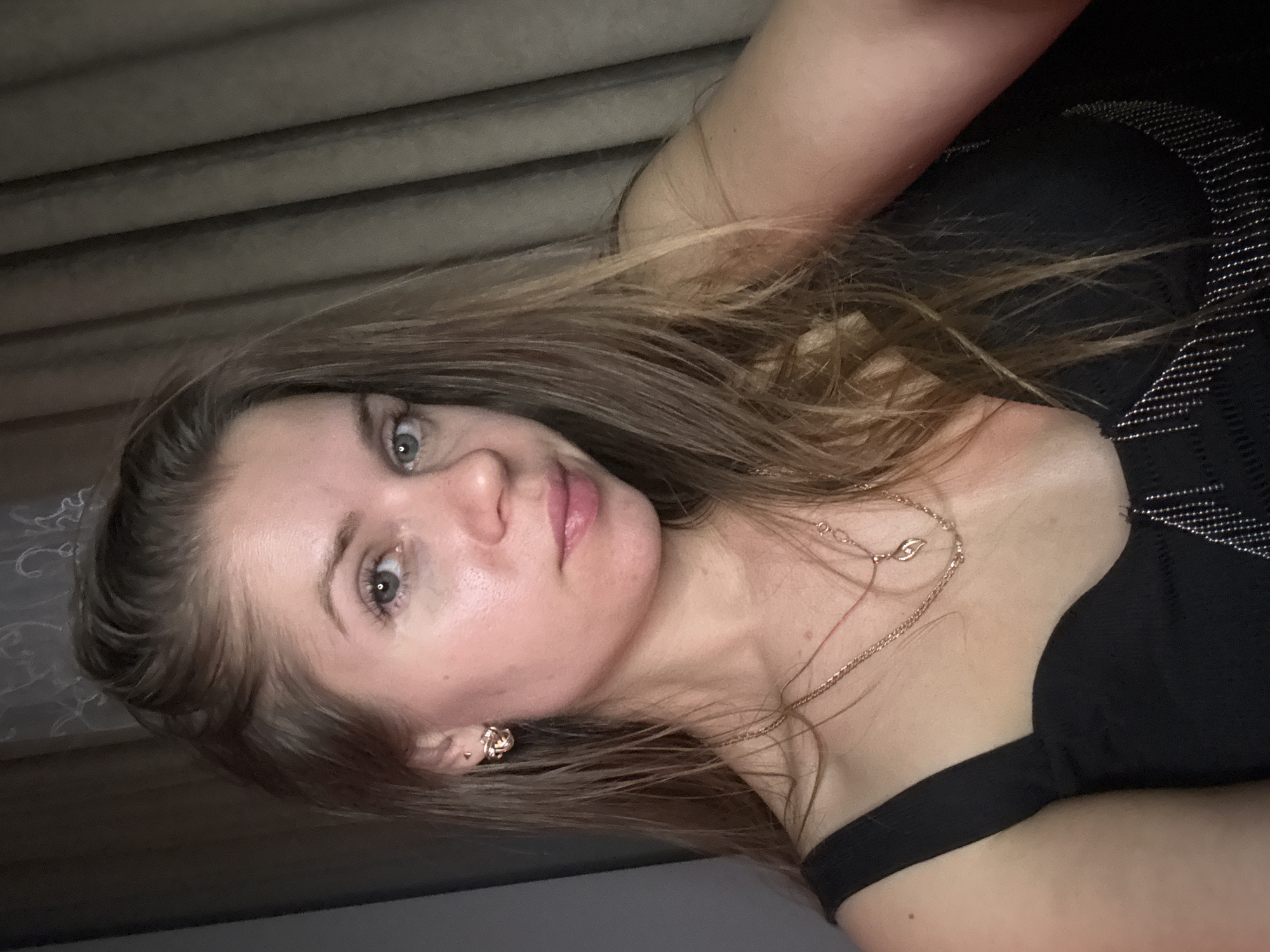 Woman photographed in Batumi residence with DJ equipment setup