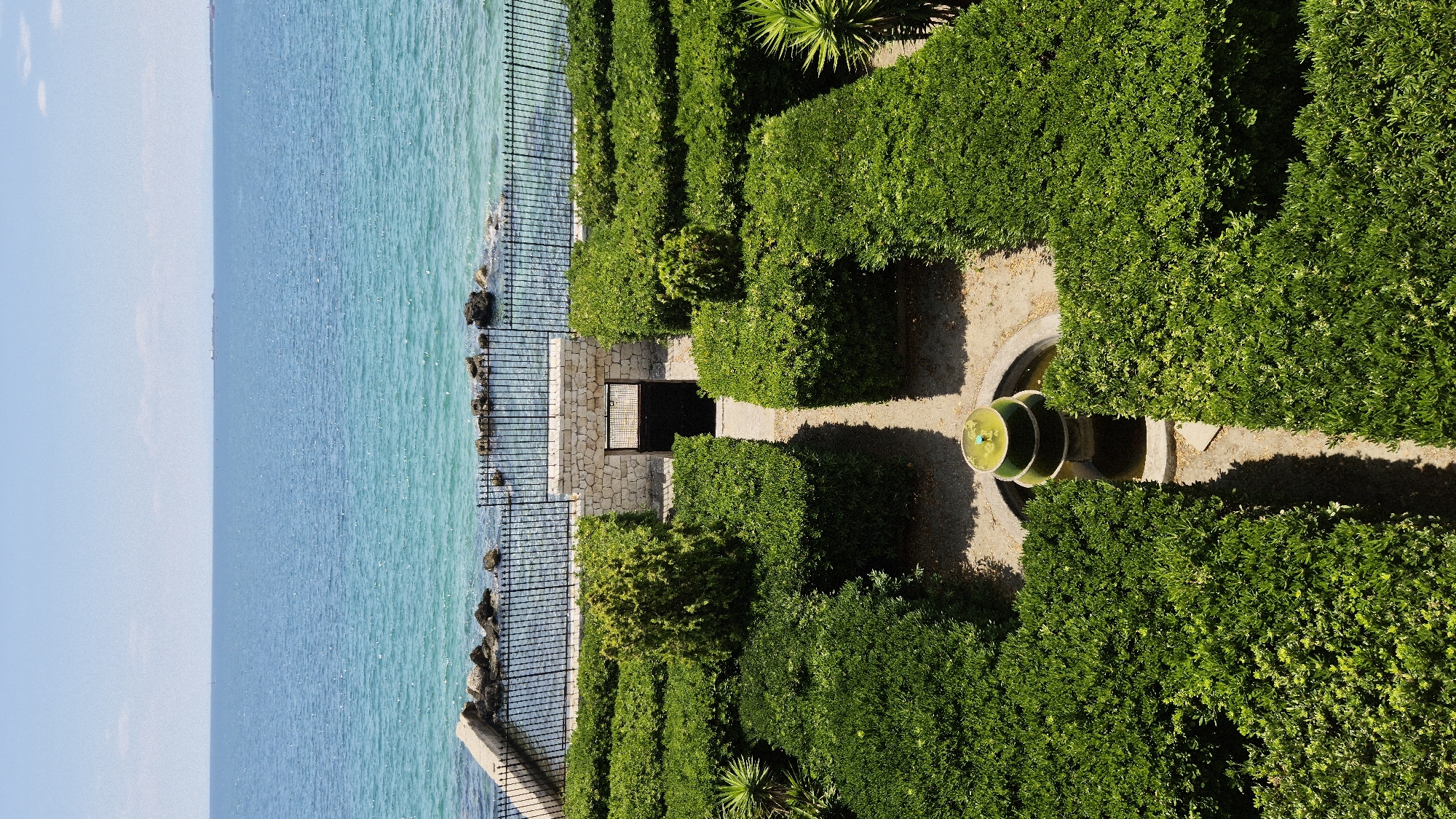Taranto's Aragonese Castle and waterfront on a July morning