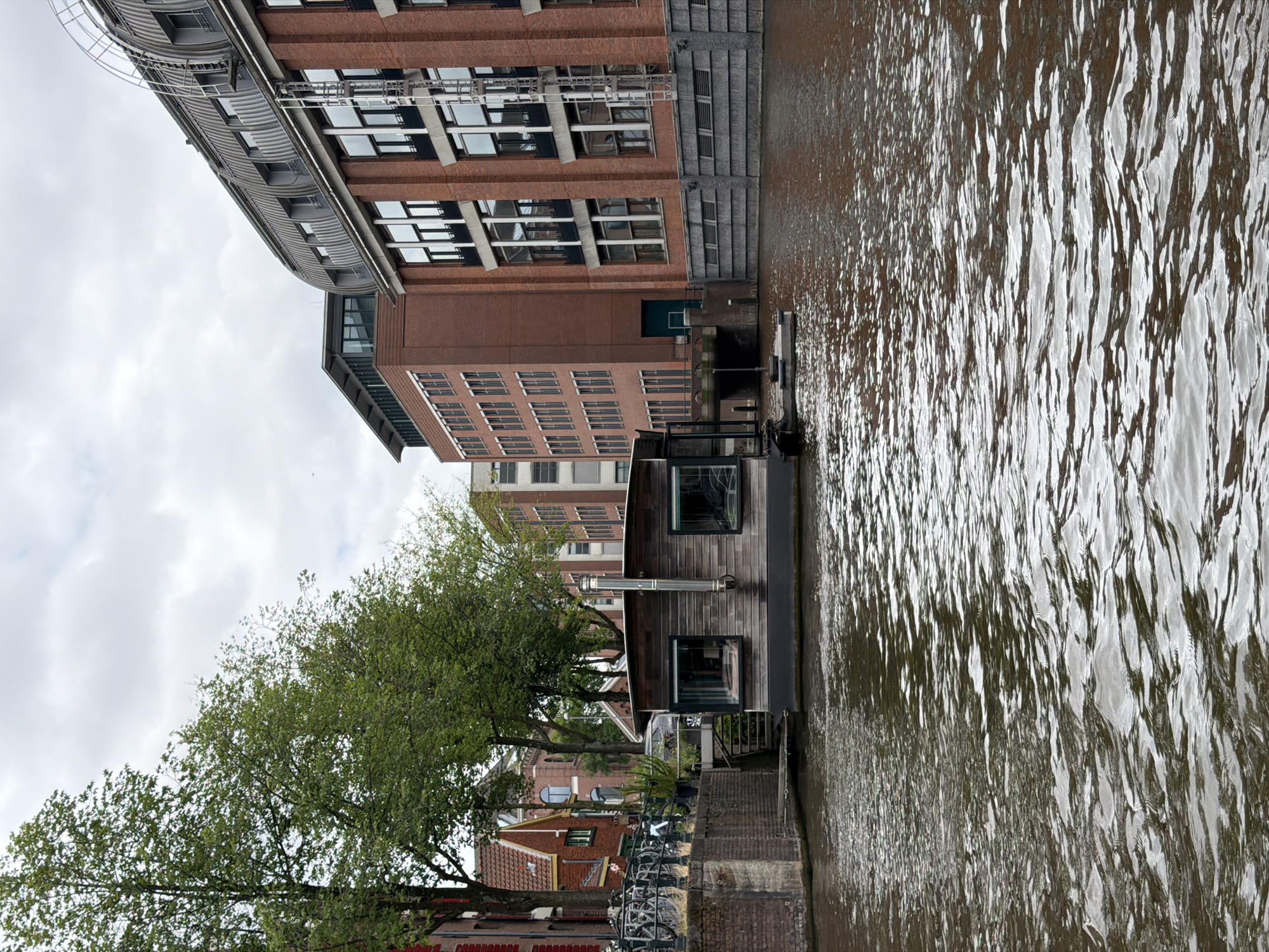 Floating through Amsterdam's canals on a grey summer afternoon