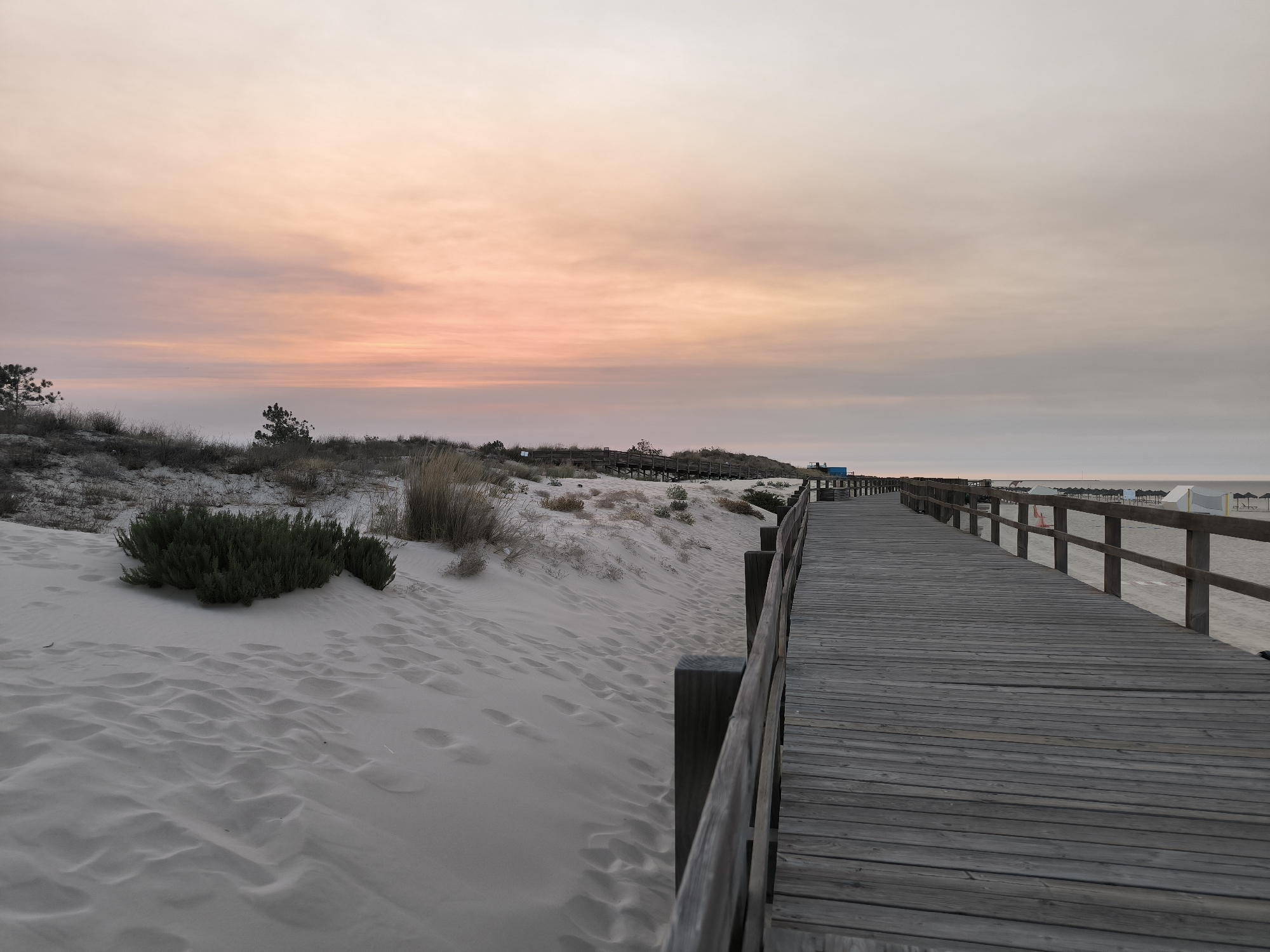 Dawn walk along the beach boardwalk in Vila Real de Santo António