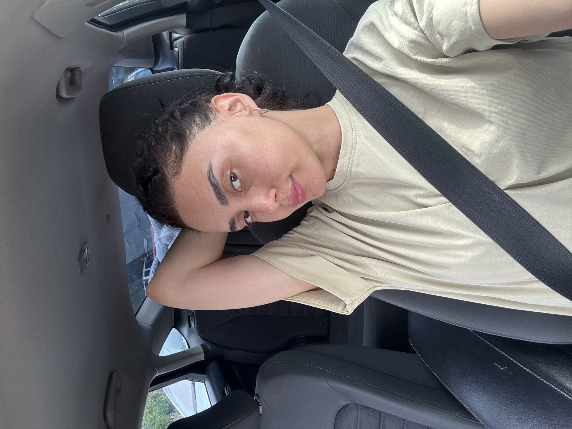 Woman photographed in car during early morning Tbilisi photo session