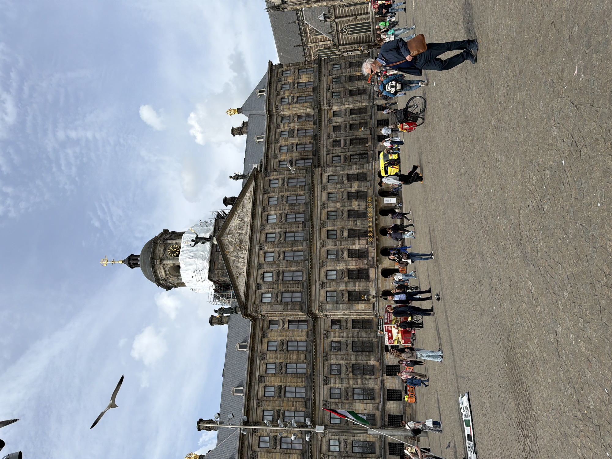 Morning activity documented at Amsterdam's Dam Square