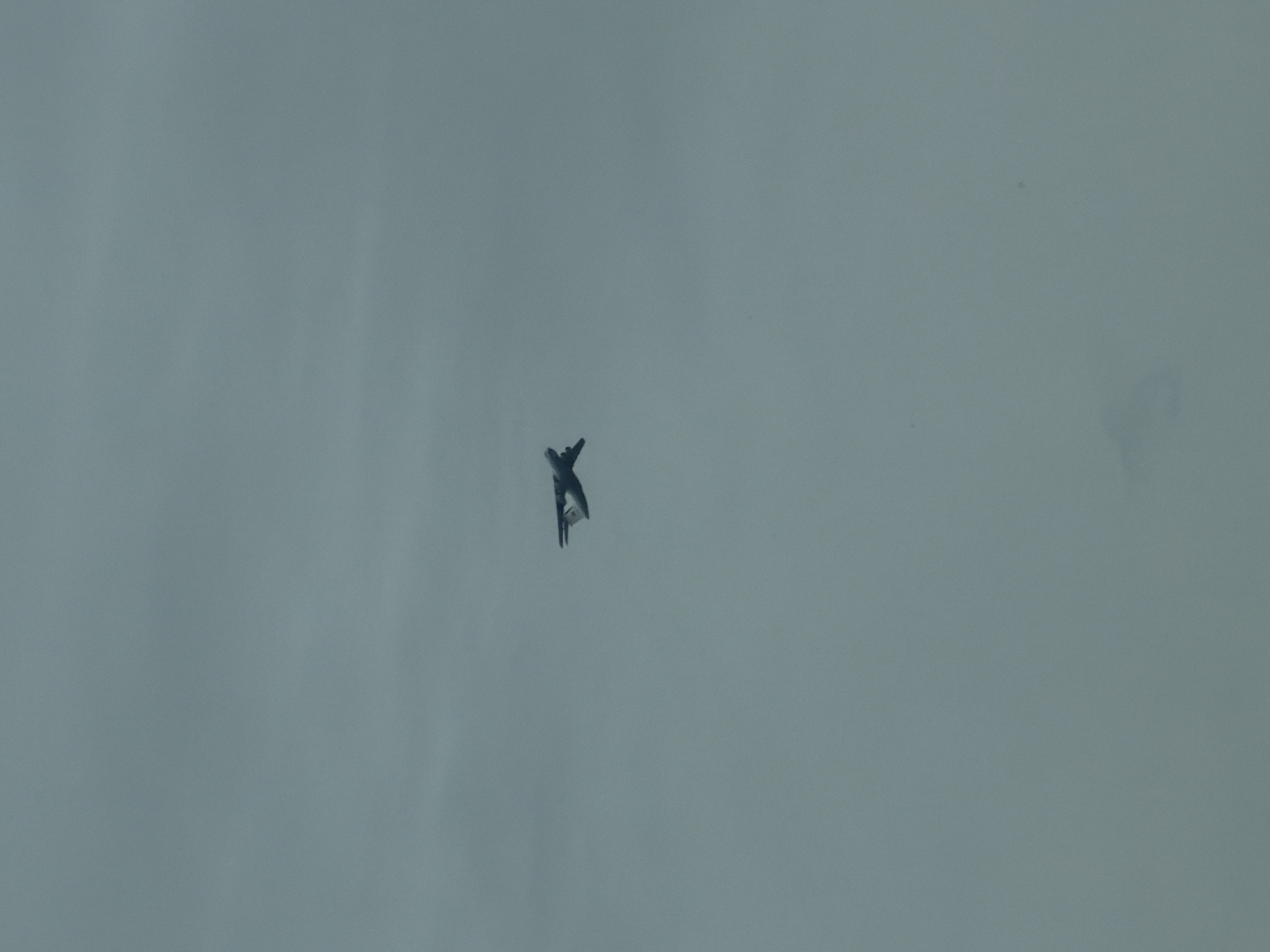 Military jet spotted over Kosoturikha, Russia under overcast skies