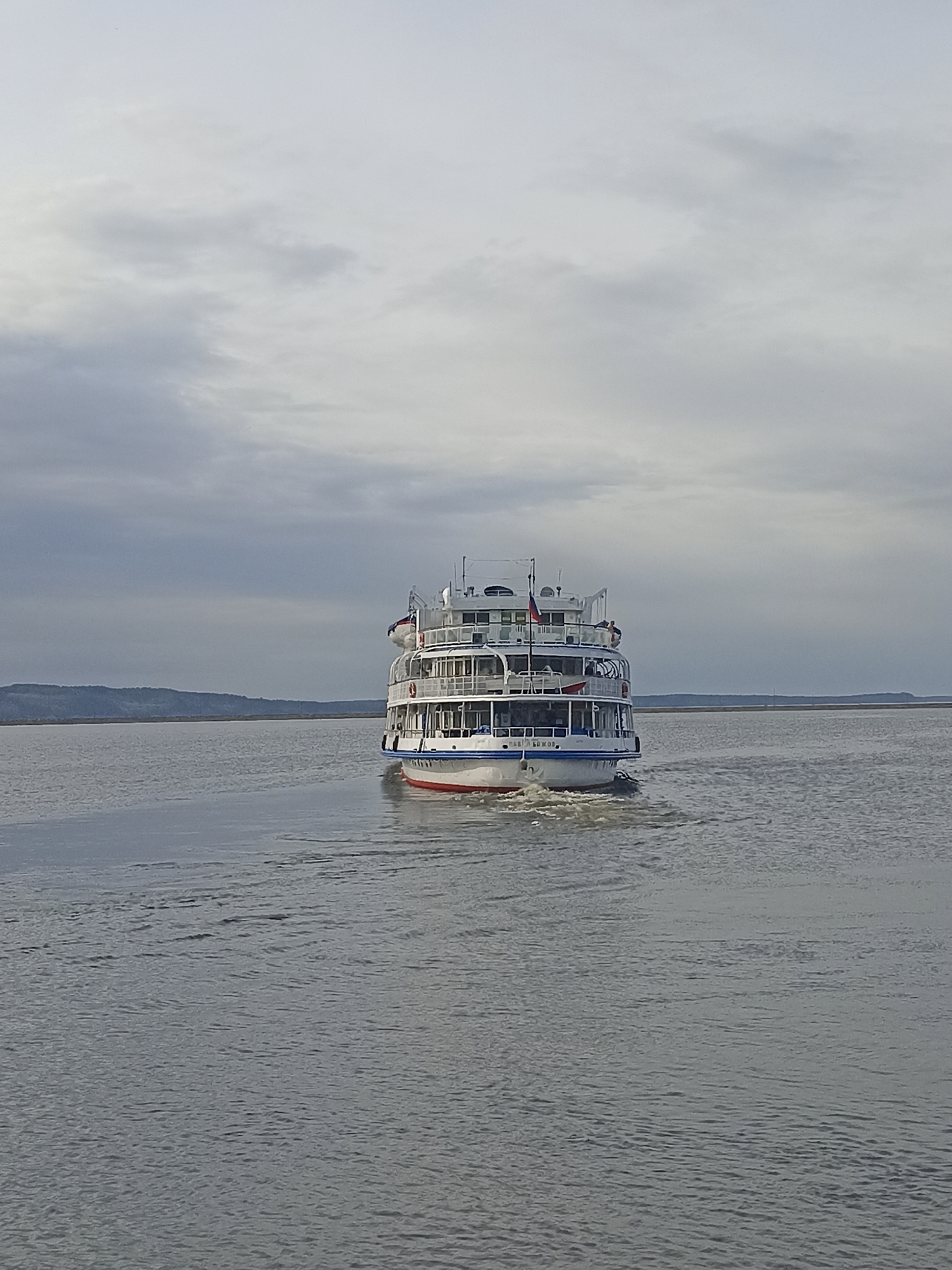 Russian cruise ships observed at waterfront port with passengers