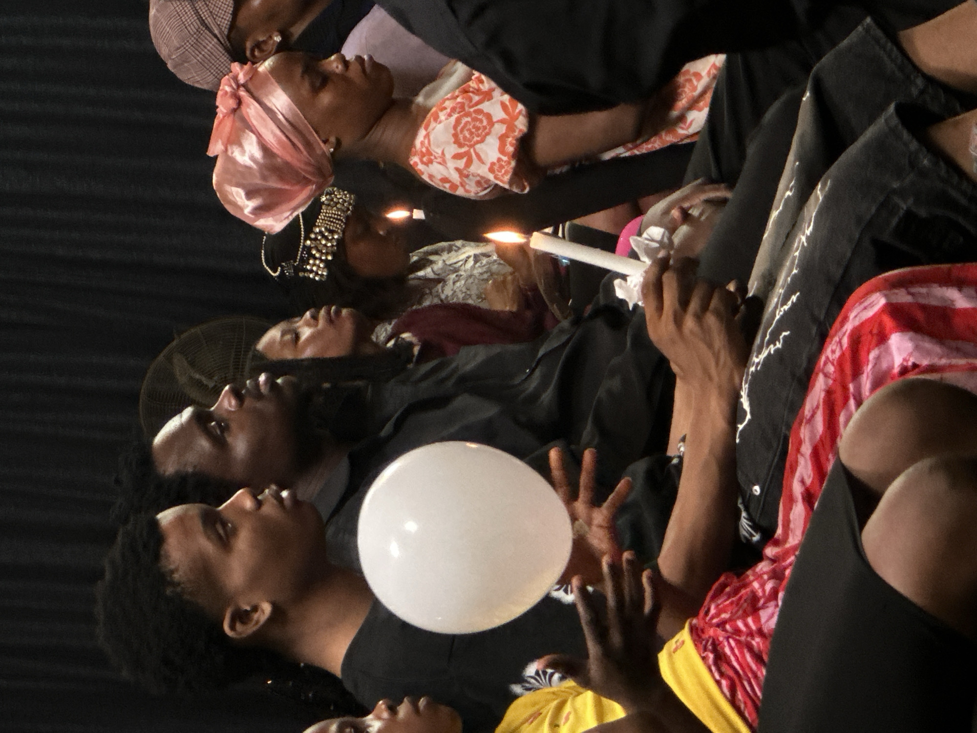 Candlelit memorial vigil held indoors in Ashipa, Nigeria