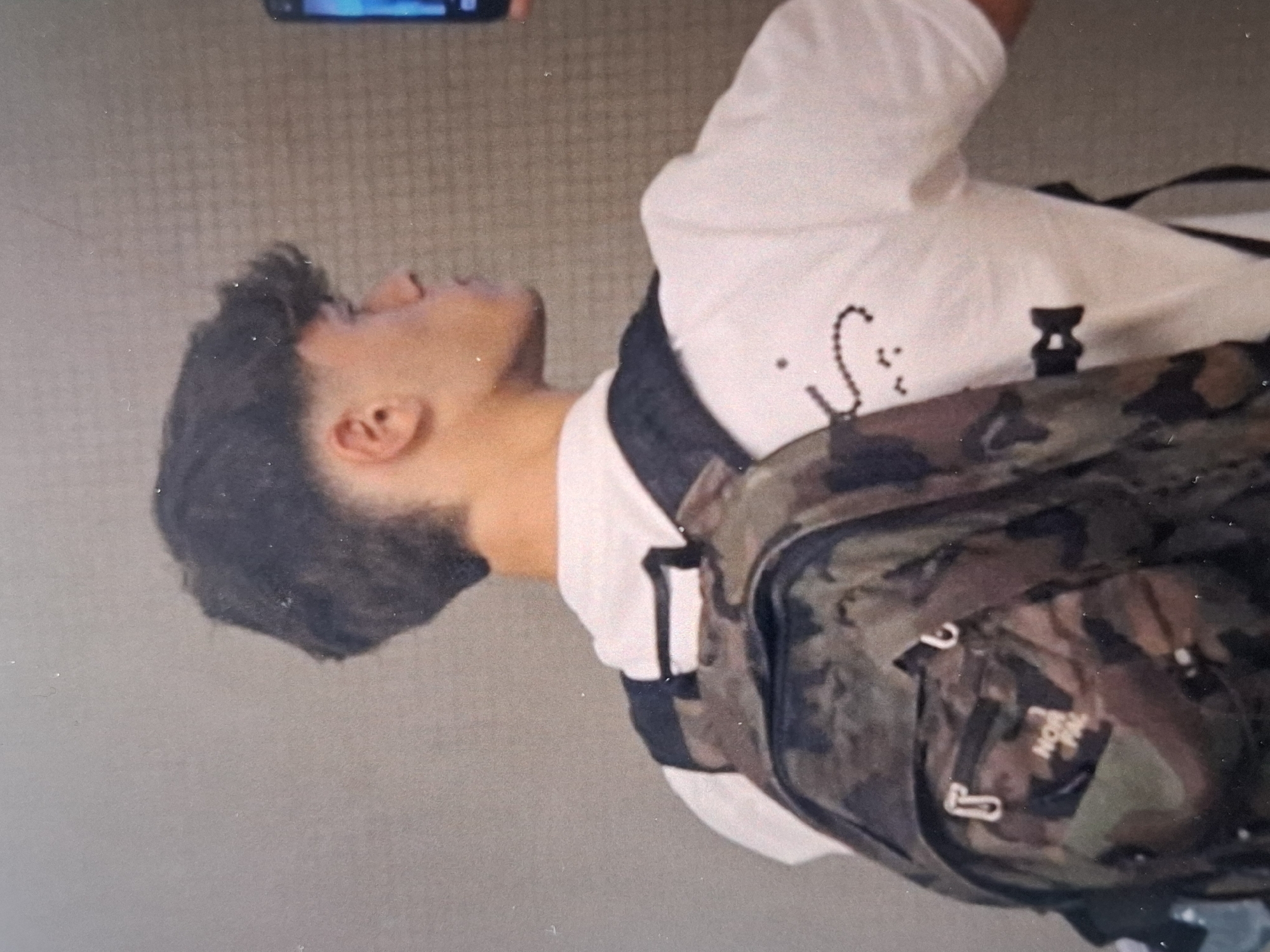Young man with camouflage backpack spotted in Pomorie, Bulgaria