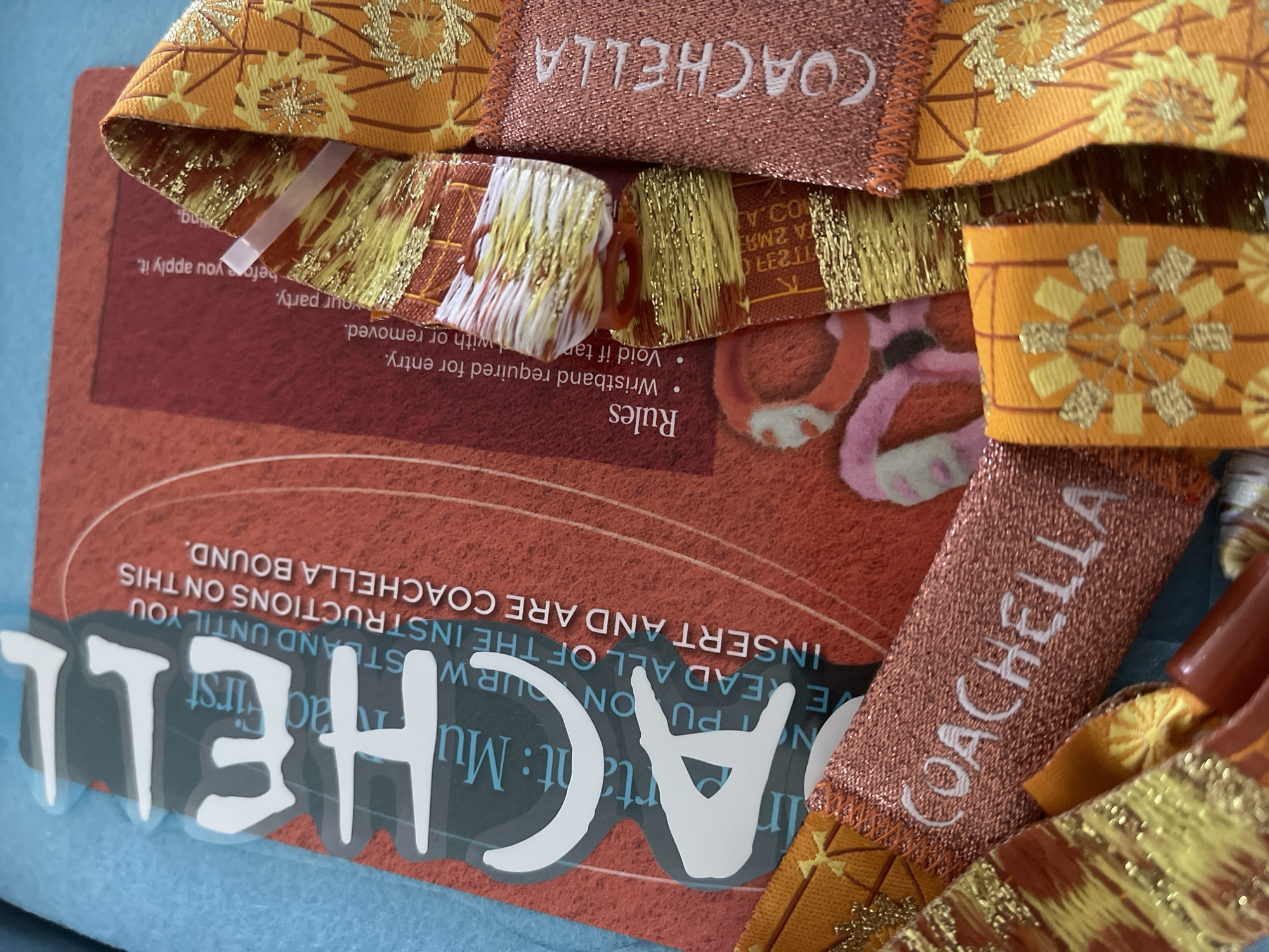 Coachella wristband photographed with instructions in Palm Springs