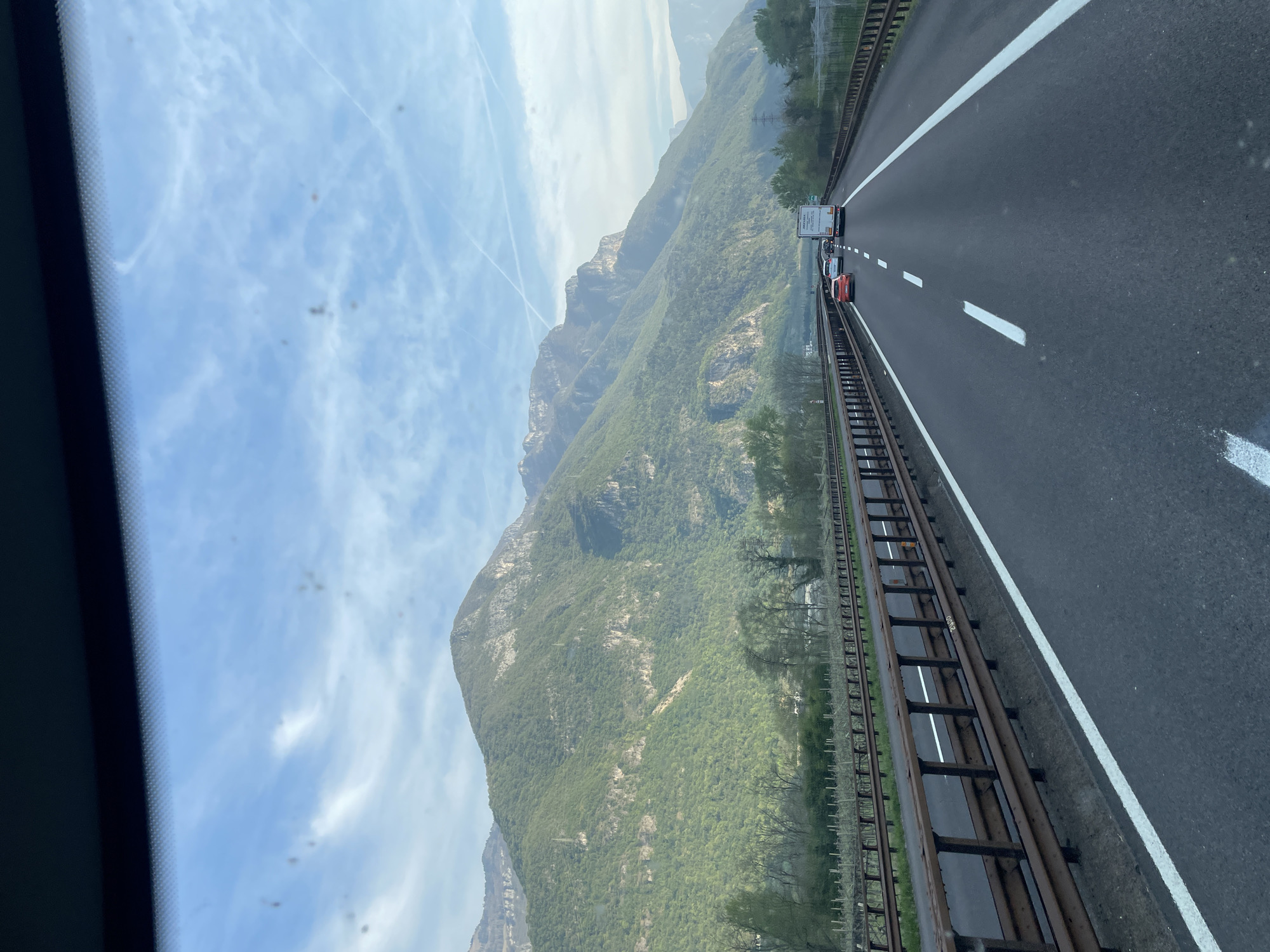 Morning highway drive captured near Dolcè, Italy