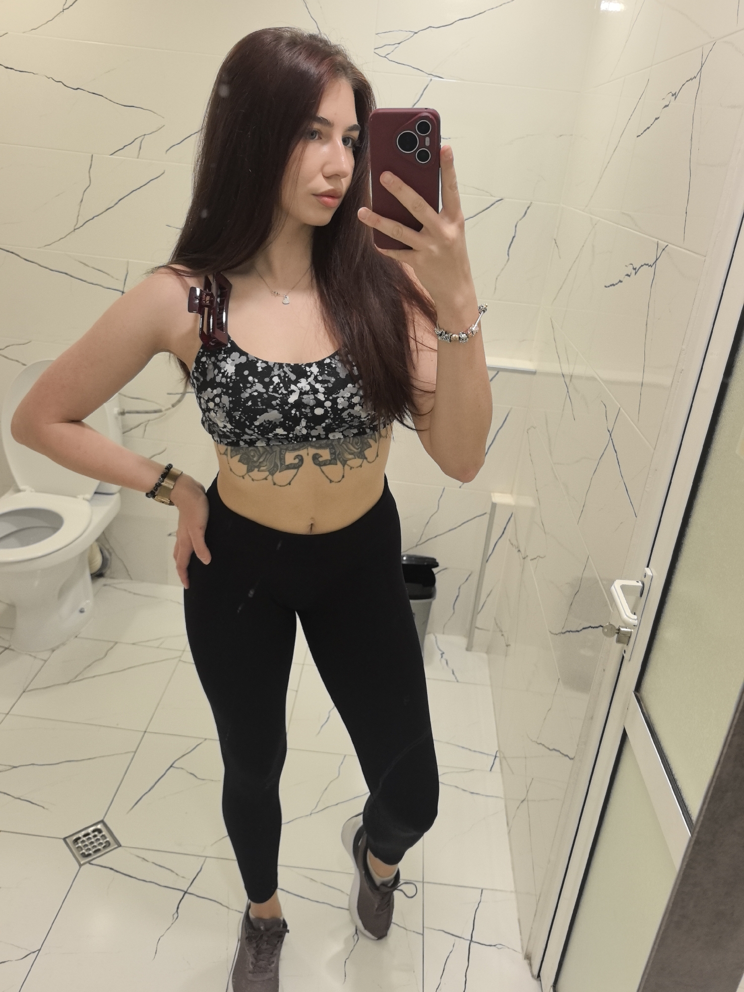 Woman Takes Mirror Selfie in Athletic Wear in Stara Zagora