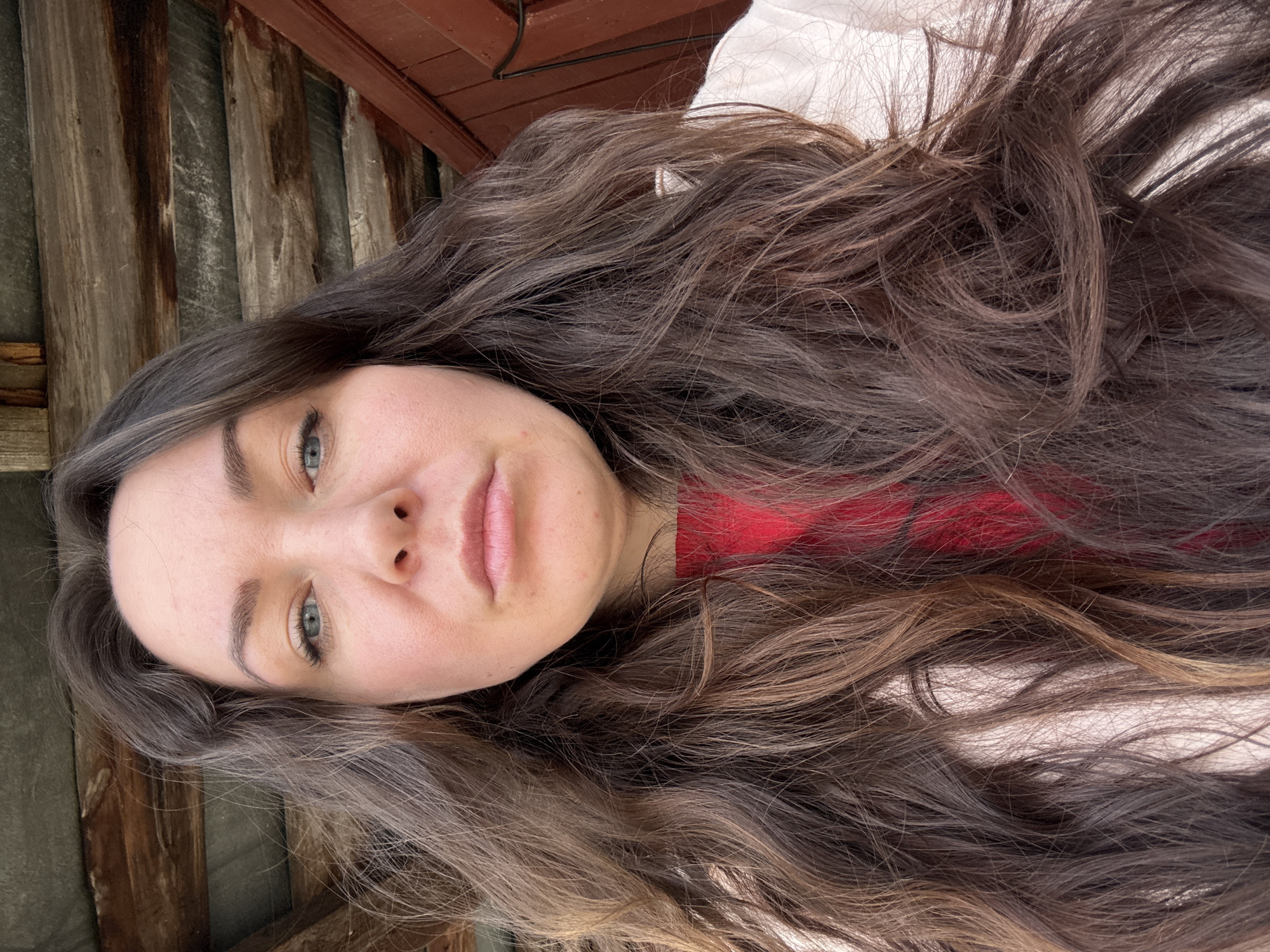 Spring morning documentation in Chaikovsky shows melting snow, personal belongings