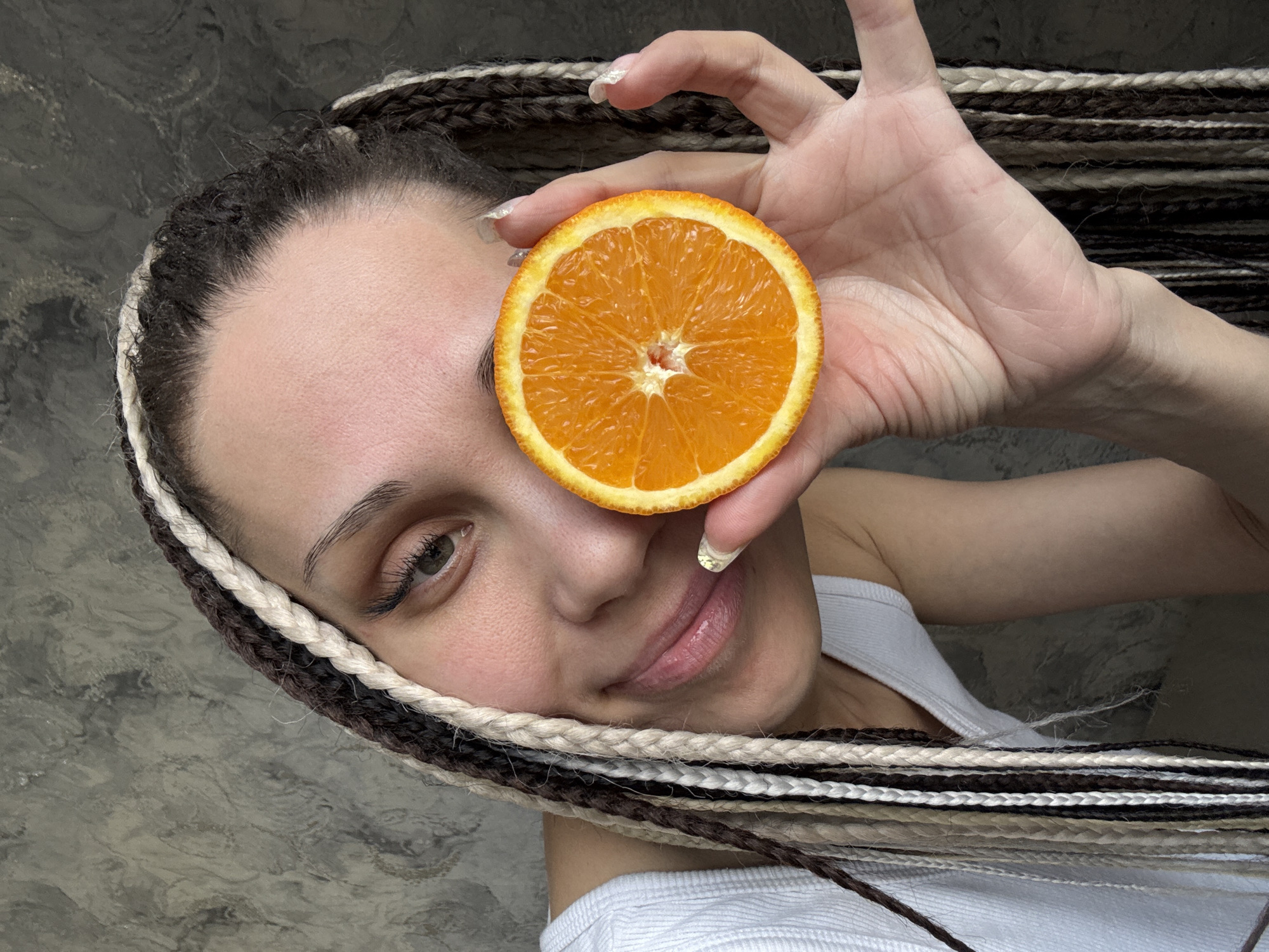 Portrait session captured in Rusanovo features playful orange poses