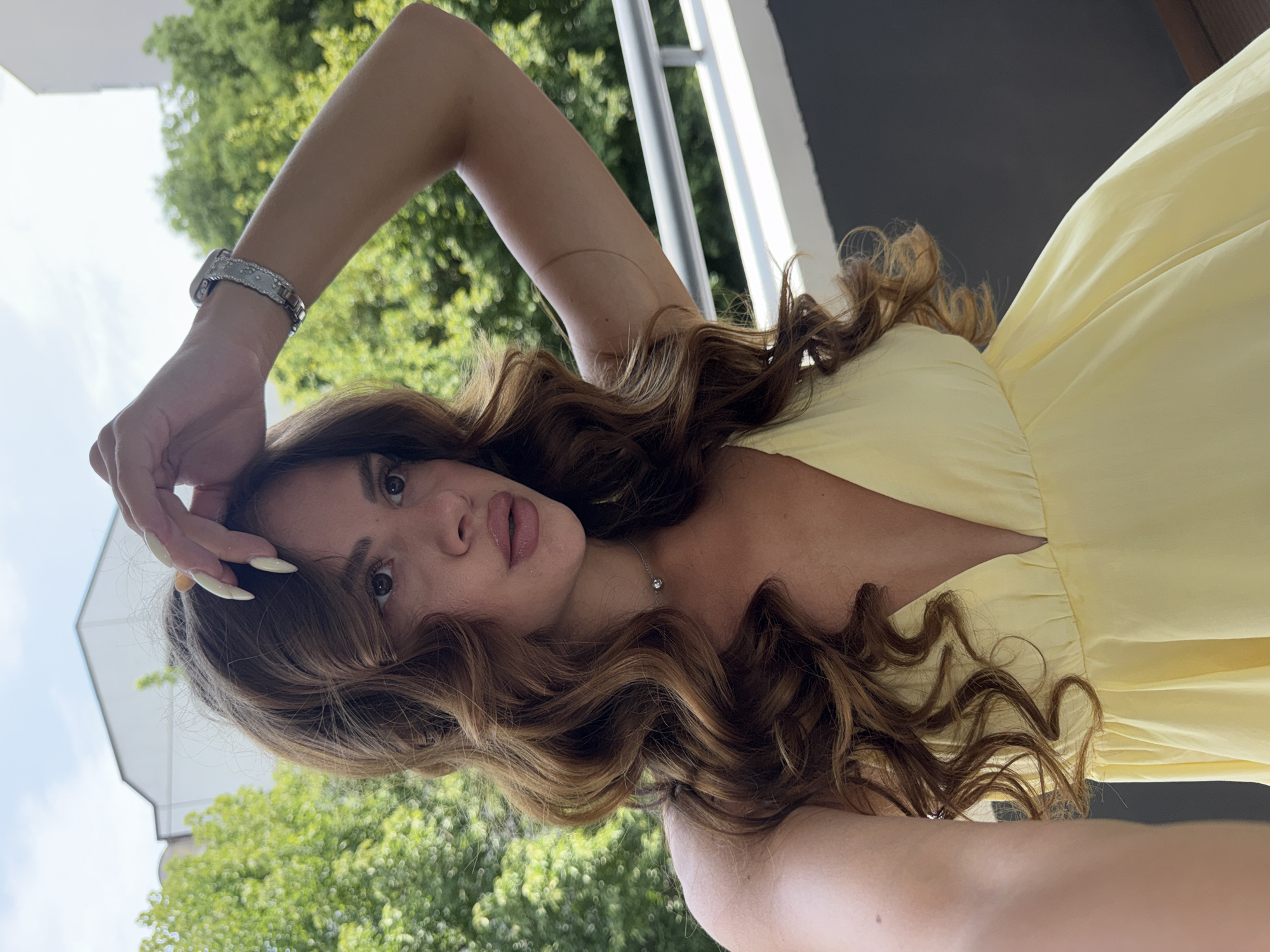 Mirror selfies and balcony shots in Plovdiv, yellow dress look