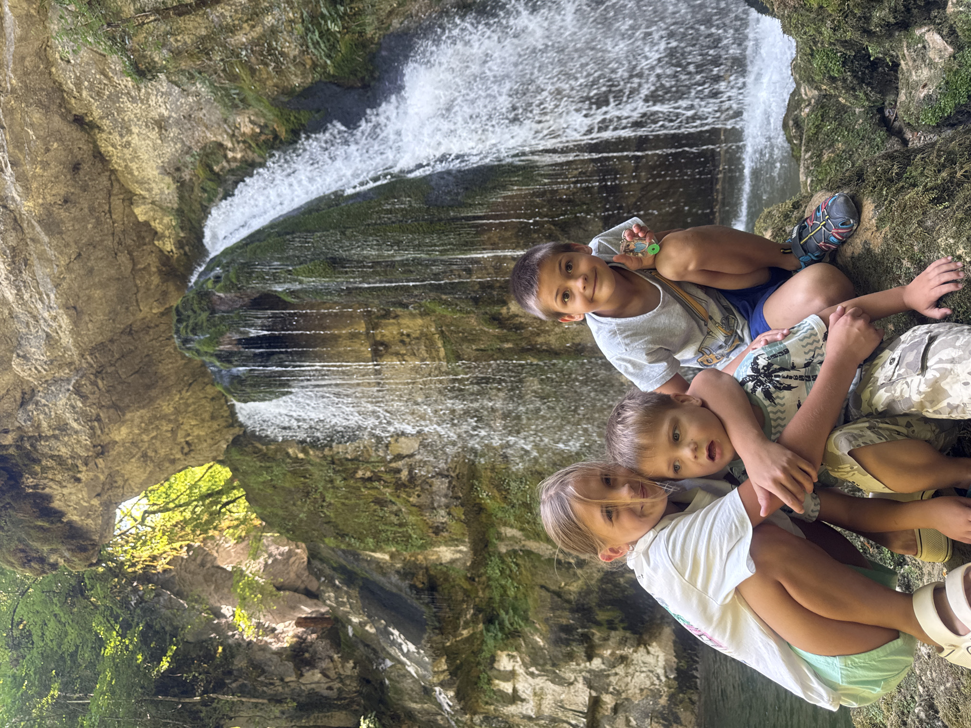 Morning at a mossy waterfall near Saint-Claude, France