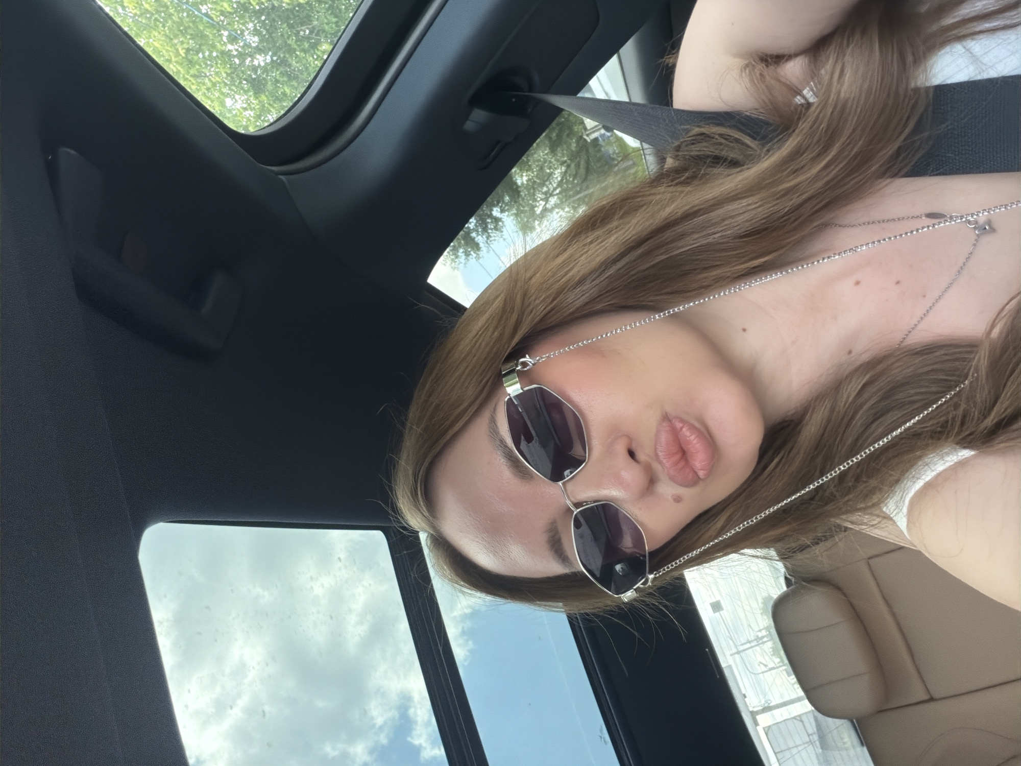 Selfie session in a sunroof car, Chelyabinsk