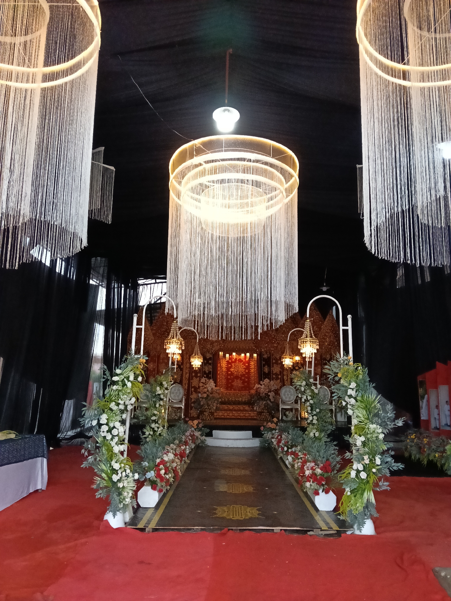 Traditional wedding venue setup documented in Lhokseumawe, Indonesia