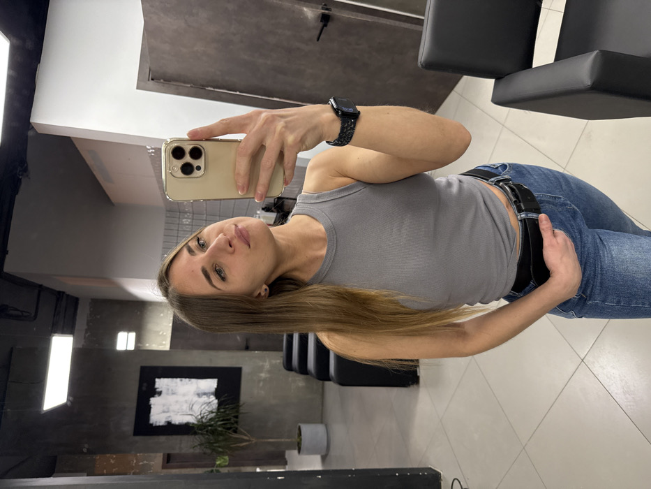 Woman takes mirror selfies at Saint Petersburg salon