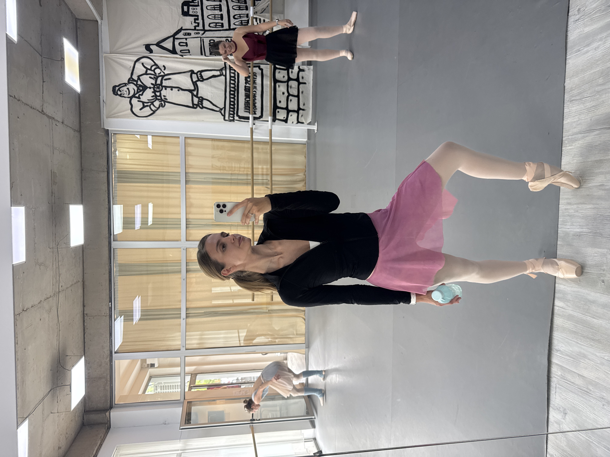 Ballet dancer captures selfies during morning practice in Tbilisi studio