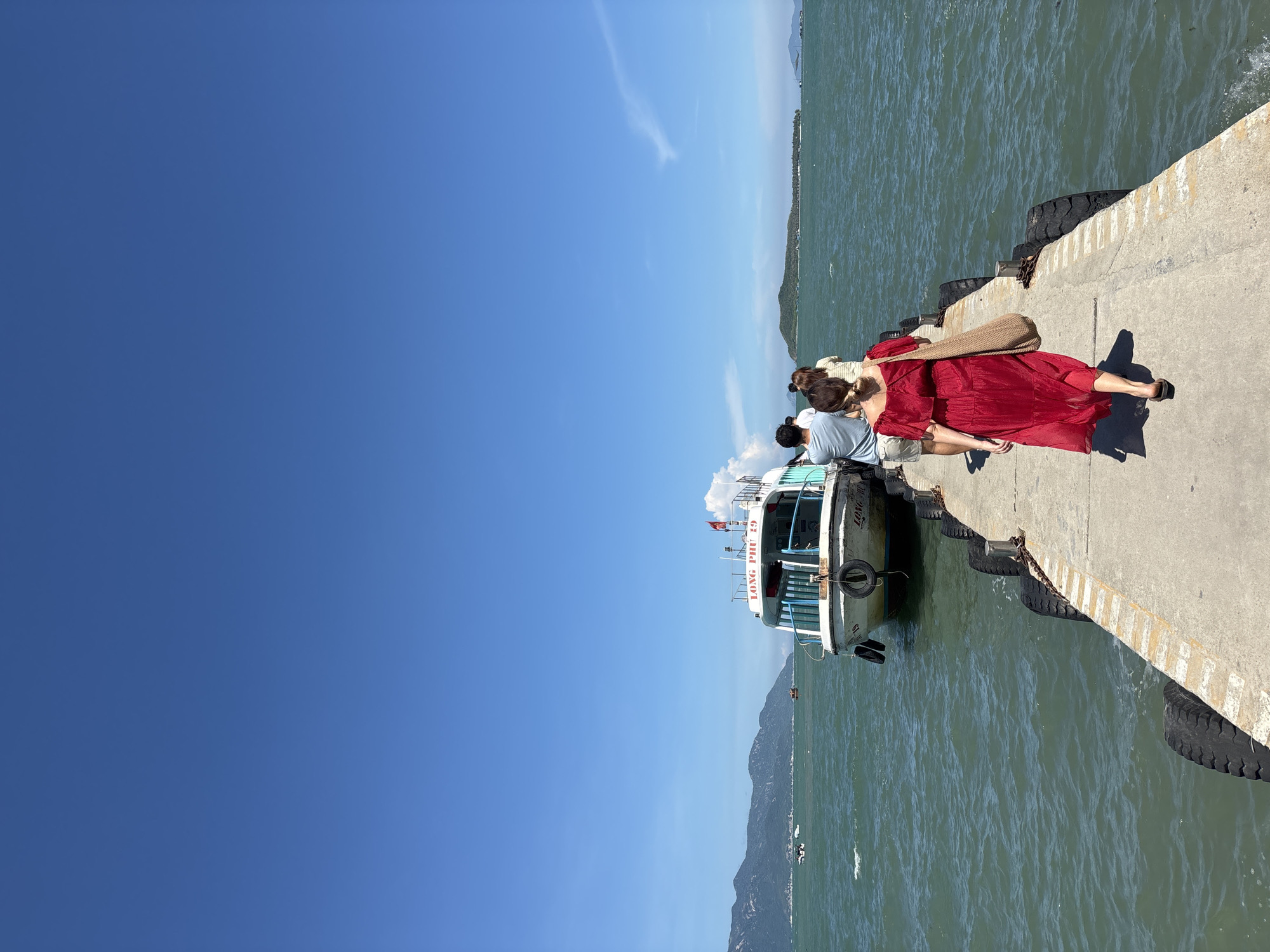 Ferry departure from Nha Trang, ocean views and crew on deck
