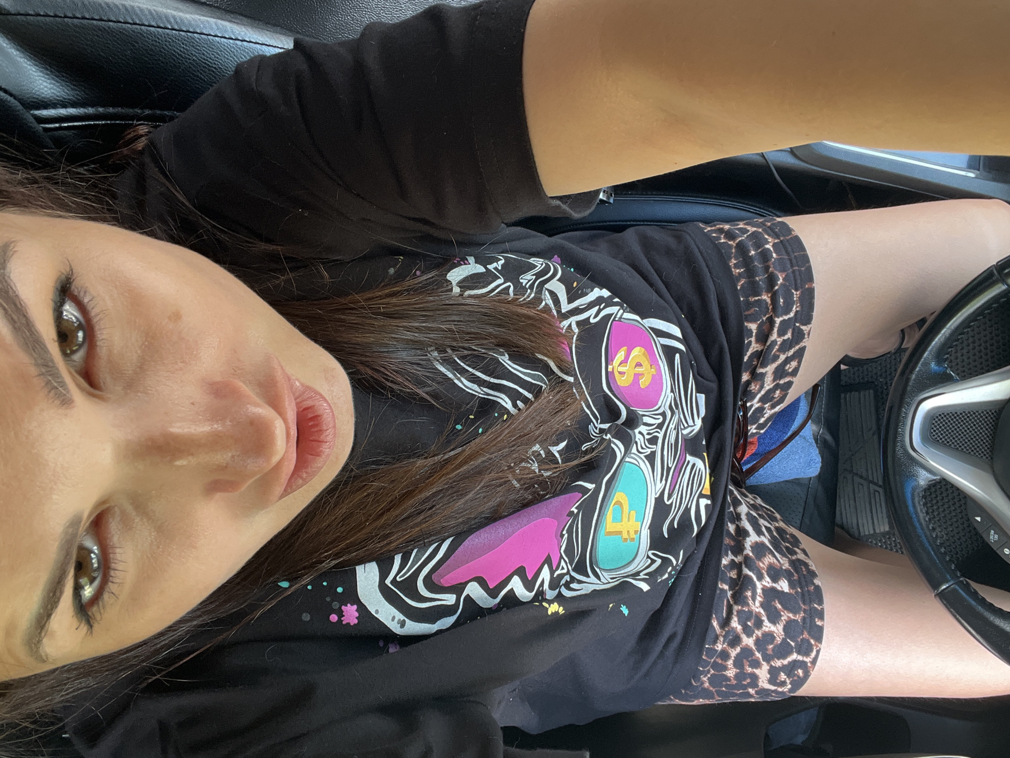 In-car selfie session during a short drive past a bank