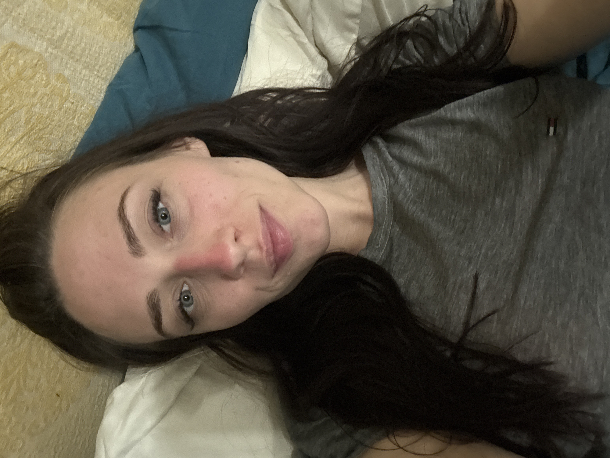 Woman and cat observed in Saint Petersburg bedroom