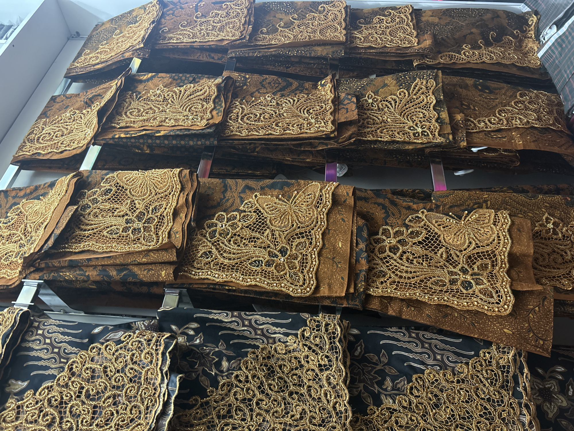 Browsing textiles, accessories, and souvenirs at an Ubud market