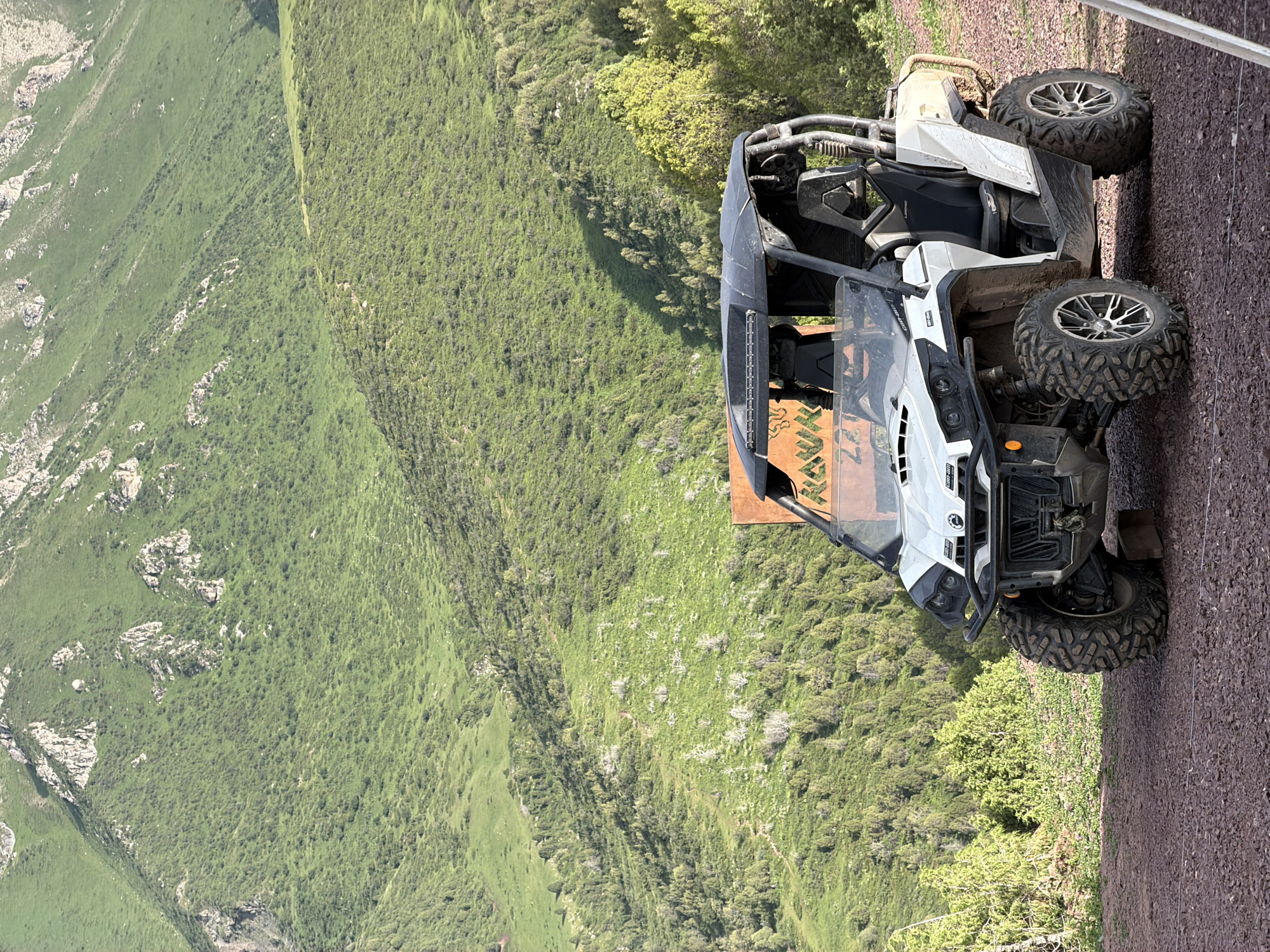Alpine gathering in Kashka Suu: tents, ATVs, and mountain scenery