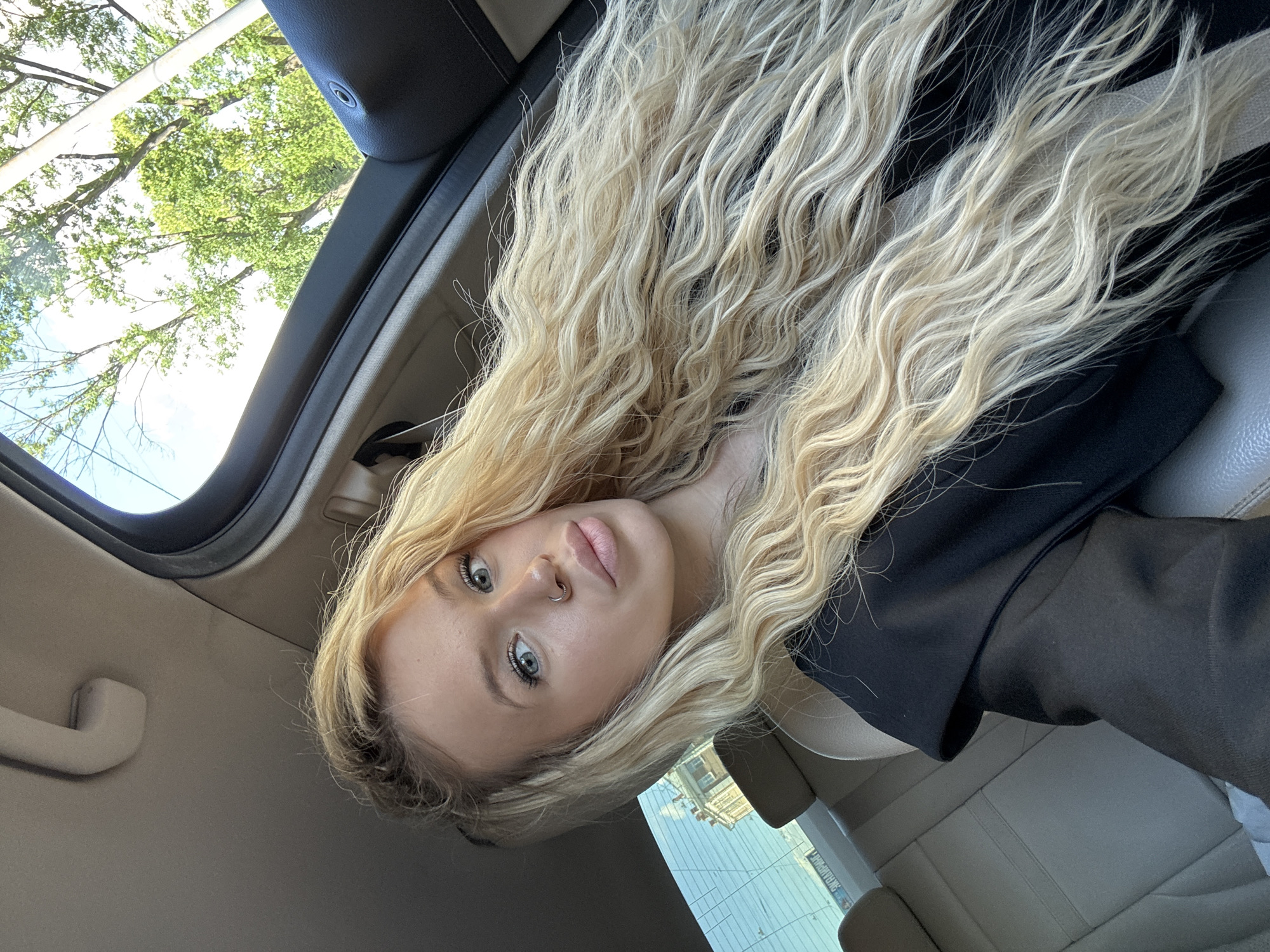Car selfie session in Saint Petersburg, sunroof open