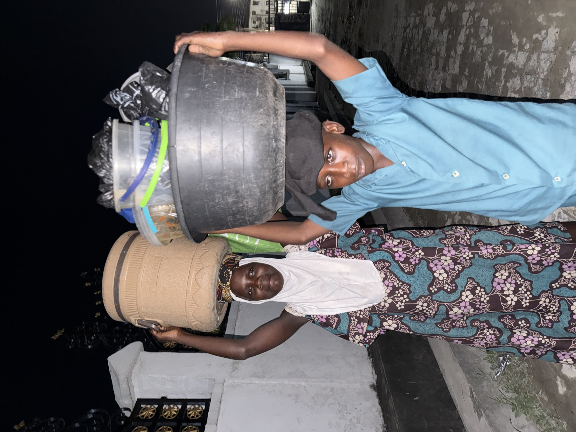 Two people spotted in Ado, Nigeria evening scene