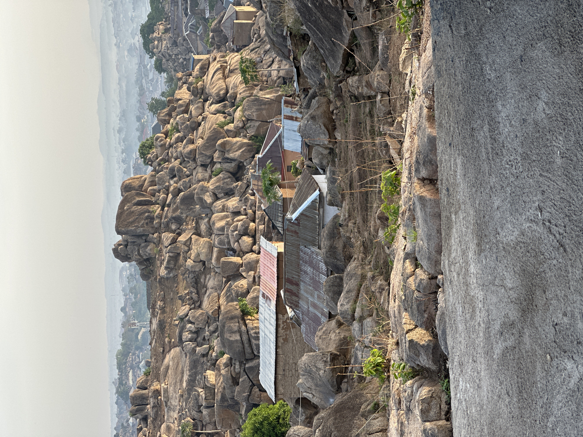 Rocky landscape documented in Jos, Nigeria hillside settlement