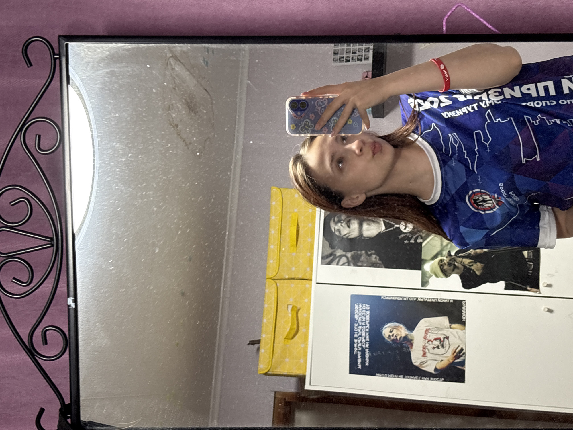 Woman takes mirror selfies in soccer jersey in Russia